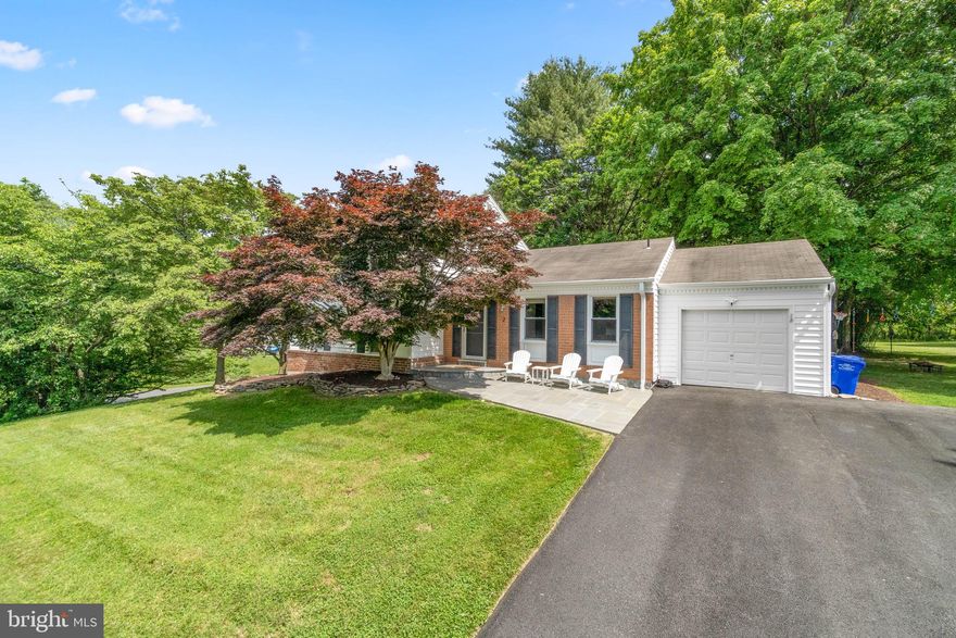 Welcome home to this beautifully updated split level on fantastic and private corner lot right across the street from Olney Square Park! The main level features kitchen with newer appliances and breakfast bar, breakfast room, dining room, laundry room, and living room with sliding doors out to the deck! The upper level includes primary suite with updated bath plus two additional bedrooms and full bath. The first lower level has a cozy family room with wood burning fireplace, 4th bedroom, and a full bath! The finished basement is awesome! Spacious rec room and a bonus room with endless possibilities. The backyard is amazing! Backing to trees/woods and only one neighbor! Plenty of yard space plus a deck and a patio for BBQs and relaxation! Updates include: new furnace and AC 2020; HVAC 2016; patio 2018; remodeled primary bath 2016; and MORE! This house is located near all of Olney's restaurants, shops, the Olney Public Library, Olney Skate Park, Olney Indoor Swim Center, and MORE!! A commuter's dream as commuter routes are close by! Don't miss this one!