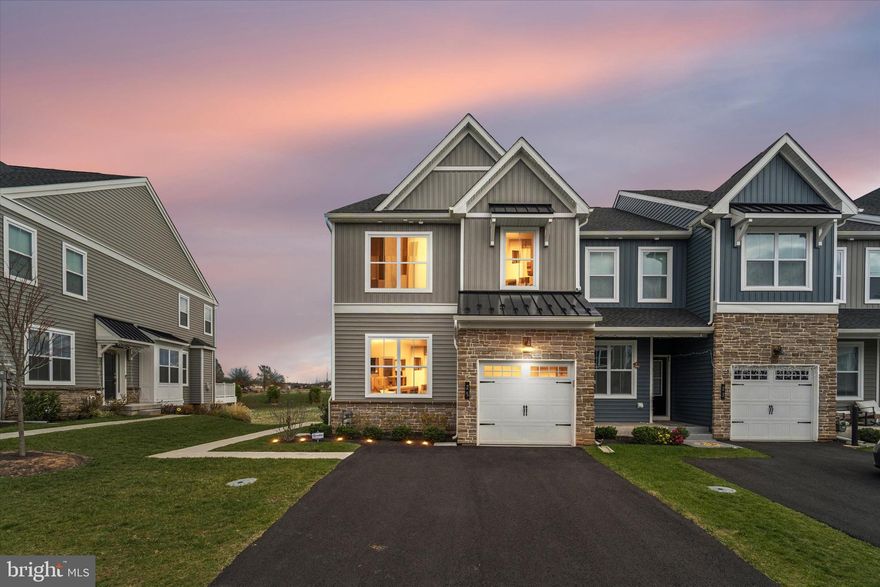 Move in before the holidays because this home already has installed the permanent light package!  After a year of cherishing this home, it’s now time for new owners! Lovingly constructed in 2024 to replicate the model home, this residence boasts four levels of living space and has undergone approximately $200,000 in pre and post-construction upgrades with approximate square feet.   This one is not like the others in Ironwood, and offers so many rooms - take a look! You'll be captivated by the stunning golf course views from the living room, sunroom, covered deck, or extended patio featuring a sitting wall.

The Rittenhouse model includes a front-entry, one-car garage with a side door that opens into a hardwood foyer. The open great room floods with natural light, leading to an impressive kitchen upgraded with quartz countertops and backsplash, a sizable kitchen island, a large handcrafted sink, high-end Samsung AI technology white glass appliances, a pantry, and hardwood floors. French doors open into the sunroom, currently utilized as a dining area, which extends out to the pressure-treated covered deck.

On the main level, you'll find a den/guest suite with a full bathroom, presently serving as a home office. As you ascend the stairs, hold onto the contemporary railing adorned with iron balusters and discover three bedrooms, two full bathrooms, and a convenient laundry room. The master suite features vaulted ceilings, dual walk-in closets, and a luxurious bathroom equipped with a double vanity, water closet, upgraded matte black walk-in shower, and a linen closet. The additional two bedrooms are spacious, enhanced with upgraded lighting, and share a hall bath with tiled flooring.

Continuing to the upper-level finished loft, you’ll find a versatile flex space. The finished basement complements this home with a home theatre package, two large closets, an additional unfinished storage/mechanical area, and another walk-out sunroom with French doors leading to the newly installed extended patio with a sitting wall.

Additional highlights include a grand lighting package, custom luxury blinds, custom shelving, Guardian Whole Home Monitoring/Protection, an epoxy garage floor, and much more. This home is truly a must-see! The WB Homes one-year punch list is currently being addressed, so all you need to do is pack your bags and move right in—after you settle, of course!