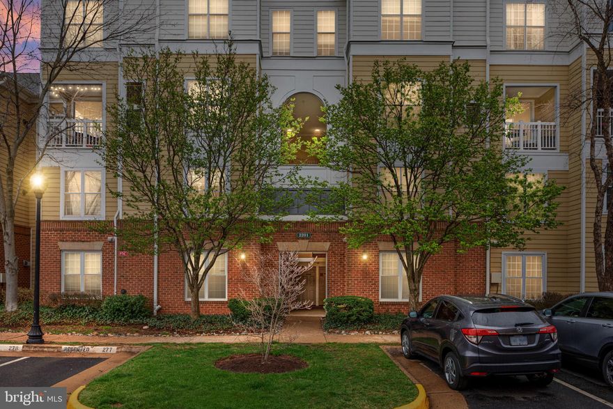 Stunning remodeled 1 bedroom, 1 bathroom 3rd floor condo with loft, in desirable Worldgate Community.   
Freshly painted throughout this light filled home includes all new flooring. Enjoy the bright living room with cozy gas fireplace and sliding glass door leading to your own private balcony. Dine al fresco while taking in the relaxing views of the pool and courtyard. Updated modern kitchen features white quartz countertops, custom backsplash, stainless steel appliances, and pantry. Breakfast area off the kitchen provides ample space for dining table and chairs. Retreat to the primary bedroom with crown molding, new carpet, and picturesque views of the pool. Custom shelving makes organization easy inside the walk-in closet. Elegant white quartz countertops and grey tile grace the renovated bathroom with tub.
Handy in-unit stackable washer and dryer located on the main level. The Upper-level loft makes the perfect home office spot. Reserved parking spot included. New water heater installed in 2022.
Convenient location a mere 0.5 miles to the new Herndon Station North Pavilion Metro opening this spring. Located 3.8 miles from Washington Dulles International Airport. Walk to numerous restaurants, shops, and AMC Theatres. Minutes from major commuter routes including the Dulles Toll Road, Fairfax County Parkway, and Route 28. Monthly condo fees include water, trash removal, sewer, snow-removal, walking/jogging paths, access to outdoor pools, clubhouse, and fitness center.