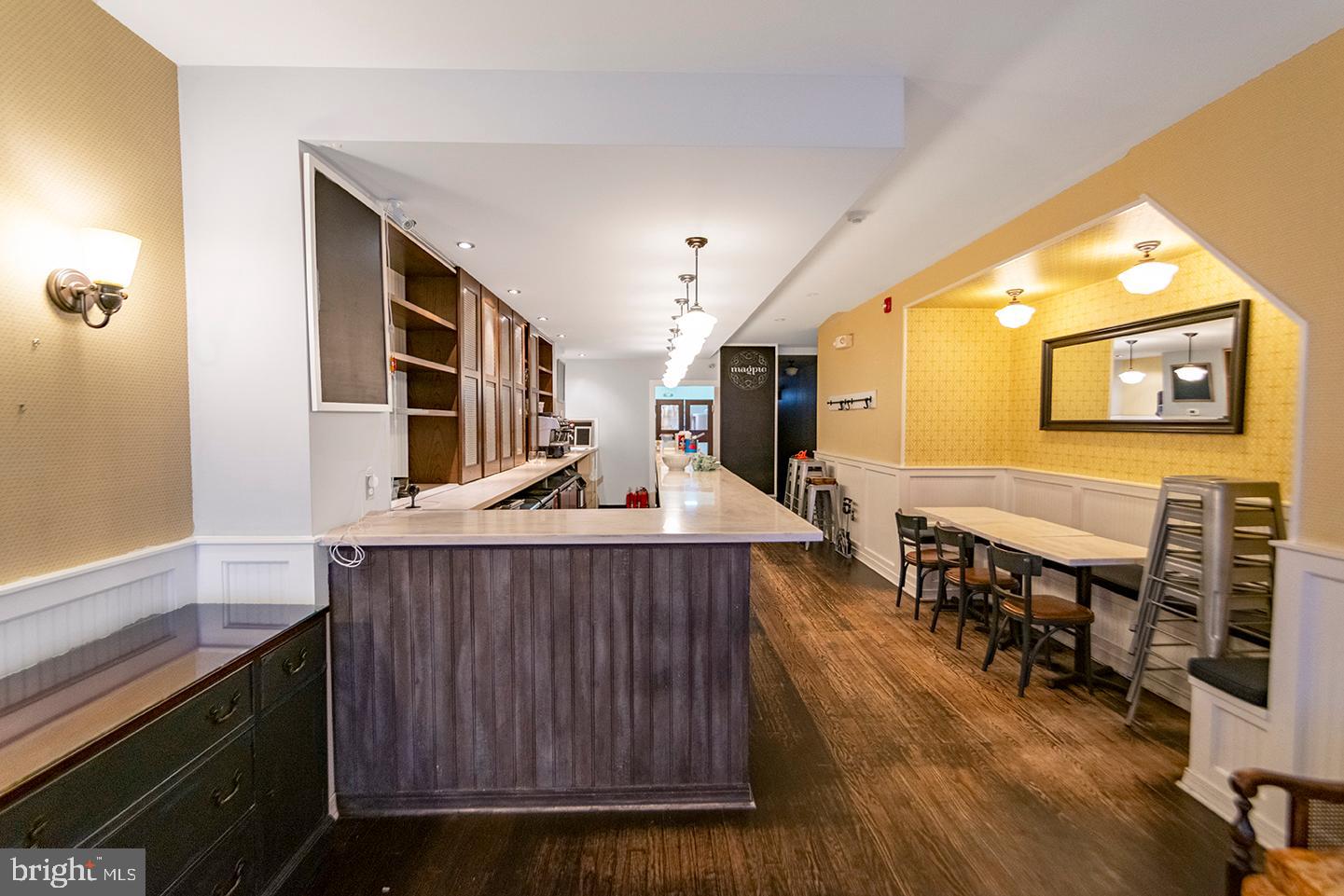 Located right on South Street, this beautiful fully furnished space was a former bakery that is available NOW. When you enter from the front door you are greeted by a long Cafe style bar with granite counter tops, wooden paneling, and vintage light fixtures. The back half of the space holds the bakers kitchen complete with equipment,a small office, and a half bathroom.Space is being offered turn-key with all equipment in place. This is a triple net lease. The tenant is responsible for a pro-rated share of real estate taxes and insurance. Business is not for sale. Tenant may not use former business' name or logo. Property does not have an exhaust system for cooking.