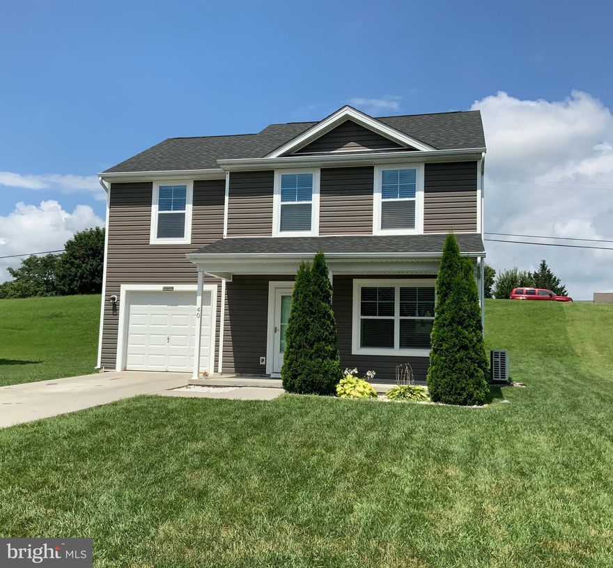 Very well-maintained 3-bedroom, 2.5-bath Colonial featuring an open layout. The main level offers low-maintenance flooring, kitchen is equipped with stainless steel appliances, spacious primary suite with private bath, second-floor laundry on bedroom level, heat pump/HVAC, front porch, walkout rear patio and garage.  Conveniently located near shopping, dining, and major commuter routes. Pets are Case by Case and Breed Restricted. Use Rentspree link for application (all occupants over age 18  must apply & have at least 600 credit score).