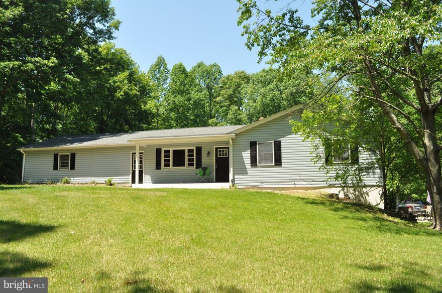 Terrific rental is recently renovated. Close to NAS Pax River. 3 bedrooms on main level and a full in - law apt on lower level. Gorgeous hardwood flooring, stainless appliances & granite countertops - loads of cabinet space in kitchen. Beautifully finished ceramic tile bathrooms.. All on 5.7 acres. This one won't disappoint!