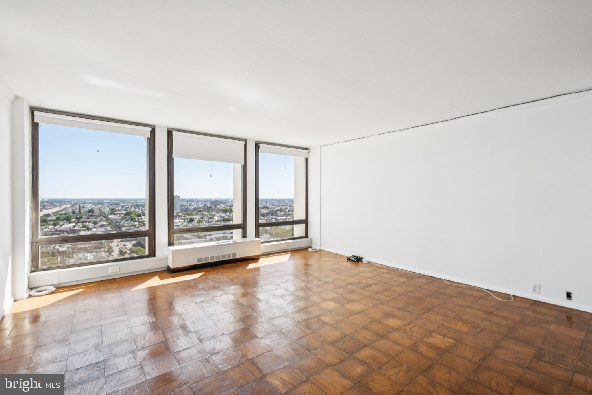 Beautifully appointed studio on a high floor showcasing river and city views at Society Hill Towers! Enter this sun-drenched flat into an open living area with parquet wood floors. The living room has an entire wall of floor-to-ceiling bay windows showcasing stunning Delaware River and city vistas. Adjacent, there is a well-equipped kitchen with wood cabinetry and granite countertops. There is a dressing area with excellent storage space that leads to the full hall bathroom with an updated single vanity and shower/tub combination. Residents of Society Hill Towers enjoy a 24 hour doorman, underground parking, access to the fitness room and outdoor pool for a fee, available hospitality suite for a fee, on-site Philly Car Share, coin operated laundry room in basement, and shopping plaza on site with market, dry cleaner and beauty salon.