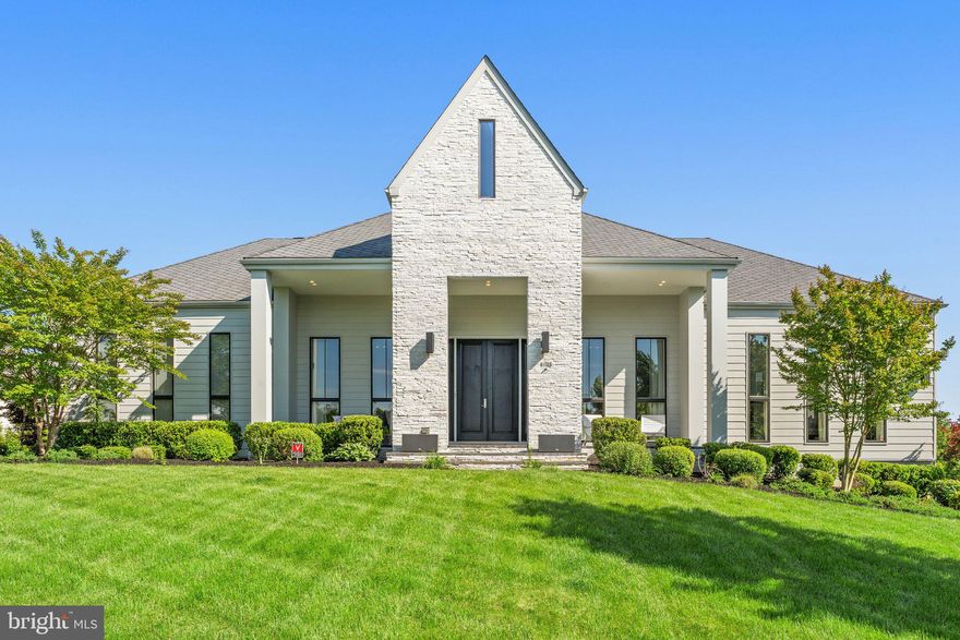 Over 9000 sqft of breathtaking Line K, the Noorderwind model is nothing like you've seen before. With expensive and top-of-the-line 2 KITCHENS, on main and club level and BASEMENT BAR, this home is a dream come true.  Five stunning bedrooms, 5 full and 2 half baths, and a $130,000 MOVIE THEATER with multilevel 12 adjustable leather seating make this home one of a kind. The WALKOUT lower lever,  full of natural light is perfect for entertainment, fun, and relaxation.  Bonus 6th massive room can be used for gym, additional guest room as it comes with a full bathroom. 
The luxury and contemporary Duch designer, Piet Boon, had reached an absolute pinnacle with this masterpiece. The one and only 12-foot ceiling Like K model is to WOW anyone who walks in. Totaling $300,000 plus in upgrades in the most desirable community Willowsford, there is no need to look any further. Impress and amaze everyone with this most exceptional architectural piece of art.
Located in Willowsford, the nation's community of the year, set in the rolling landscape of Loudoun County, inspired by Virginia's farming heritage! This resort-style community offers numerous amenities including Community Pools, Clubhouse, Fitness Center, Community Events, a zip line, tree houses, lakes, fishing ponds, a water splash park, Willowsford Farm, and more! Easy access to Dulles Airport, Shopping, Restaurants, Vineyards, Commuter Routes, and Metro Rail Extension is only 10 min out.