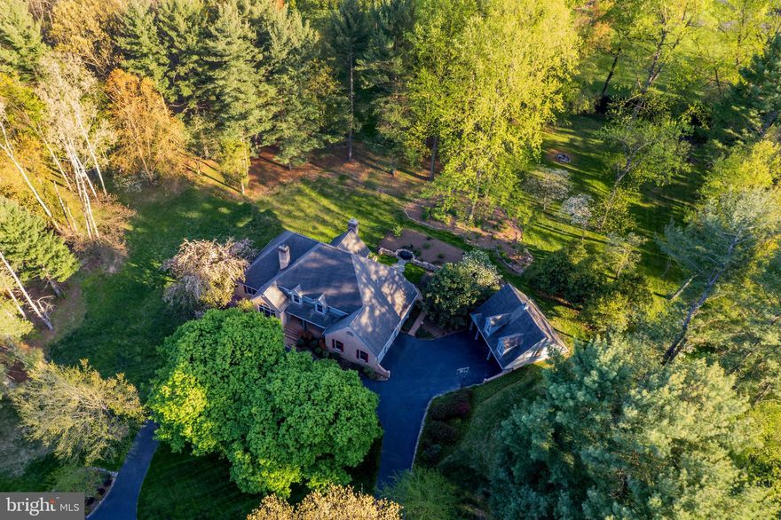 Just minutes from Hunt Valley, nestled in the most convenient and highly coveted pocket of the Hereford Zone, awaits this very special find. Sited on the most picturesque 3-acre lot in the enclave of Northcote, this stately custom-built traditional is everything you’ve been searching for. Surrounded in lush landscaping and a rainbow of ever blooming colors, this is a true ‘feel good property’ from the moment you arrive. Step inside to a timeless and sought-after floor plan; the perfect blend of traditional flow and today’s desired open concept. Feel uplifted by the incredible natural light with oversized Pella windows and perfect southern exposure. Stunning great room with statement ceiling opens to custom kitchen and flows perfectly to private backyard sanctuary. First floor office with rich built-ins, fireplace and the most striking window looking out to greenery. Main level primary with lux spa-like bath and direct connection outside. Step upstairs to a spacious second level with three well-proportioned bedrooms and two bathrooms. A surprise third floor suite is the ideal bonus space to fit any need. Step down to finished lower level with recreation space, wet bar and tons of storage. Walk outside and feel immersed in nature. A truly special piece of land with stunning mature plantings. Completed with a picturesque carriage house with unfinished second floor and endless possibilities. Discover a lifestyle where total convenience melds with the serenity of nature. This is exactly what you’ve been waiting for, just in time for Summer. Cultivate your existence. The art of uniting human and home.