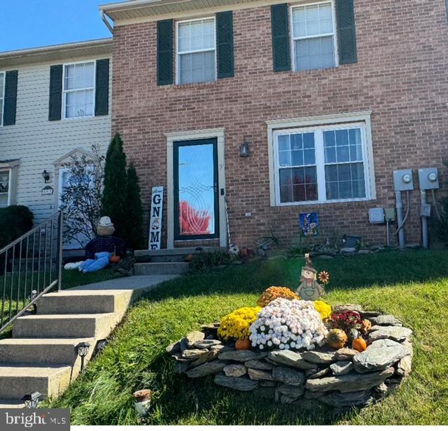 Welcome to this beautifully maintained townhome in the heart of Littlestown. Filled with natural light, this freshly painted 3-bedroom, 1.5-bath home features brand-new flooring and carpeting throughout. The spacious kitchen includes recently added cabinets for extra storage and functionality and opens to a bright dining area and a large living room—perfect for everyday living and entertaining. A door from the kitchen leads to the privately fenced yard, complete with a deck and storage shed, ideal for relaxing or hosting guests.

Upstairs, the primary bedroom offers both a large walk-in closet and an additional closet. Two more generously sized bedrooms and a full hallway bath complete the upper level. The finished lower level provides extra living space that can be used as a rec room, playroom, or home office, and includes a half bath and plenty of storage.

Located close to local conveniences, this move-in ready home blends comfort, space, and charm.