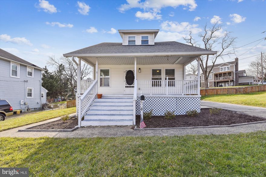 Welcome to 2 Holmes Ave! This beautiful bungalow features an abundance of living space and has been meticulously maintained with thoughtful updates throughout. The main level has beautiful hardwood floors and tasteful neutral paint. The family room is massive and gives the home a great, open feel.  The wood burning stove is great for those chilly winter nights. The kitchen has granite countertops, an abundance of cabinet space, and stainless appliances. There is also a main level bedroom and full bath. Upstairs there are three additional bedrooms and two full baths. The primary suite is very spacious, with a walk-in closet and recently renovated bathroom. The two other bedrooms are generous in size. The laundry is conveniently located on the upper level. There is a deck off the family room and the yard is fully fenced in the rear. The driveway offers ample parking and provides easy access into the home through the side entrance. Basement is unfinished with an abundance of storage space. Located close to all of your favorite Catonsville amenities with easy access to numerous commuter routes. Life is GREAT in 21228!