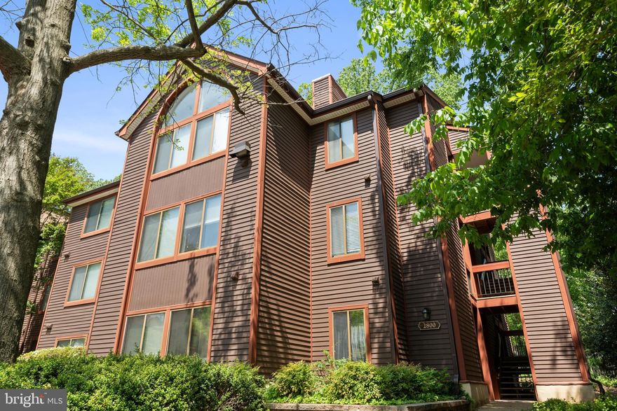 Welcome to 2800 Lee Oaks Pl #302—a beautifully updated top-floor condo in a prime Falls Church location! This light-filled 2-bedroom, 2-bath plus den unit features gleaming hardwood floors (2017), a brand-new HVAC system (2024), and recent kitchen upgrades including a new dishwasher and microwave (2024). The large primary bedroom has an en-suite bathroom with a separate soaking tub. The unit also features a stacked washer/dryer for the convenience of in-unit laundry.  Enjoy the open floor plan, cozy wood-burning fireplace, and private balcony with serene views. Just minutes to the Metro, Mosaic District, shopping, dining, and commuter routes. This move-in-ready home offers comfort, convenience, and exceptional value in one of Northern Virginia’s most desirable communities.