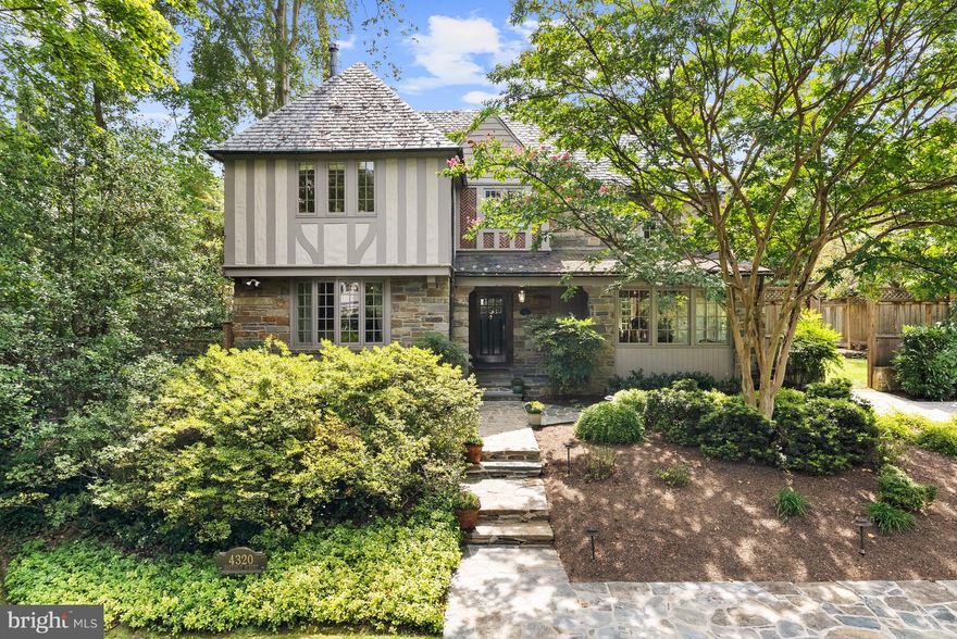 Nestled on a manicured 0 .28-acre parcel in Wesley Heights, 4320 Garfield St NW presents a masterfully crafted Tudor, showcasing ageless design and honoring its historic architectural integrity. Boasting 5 Bedrooms, 4 Full Bathrooms and 2 Half-Baths across 5,20 0 total square feet , the residence offers expansive Garden Space for effort less indoor-outdoor living. The Main Level lends large entertaining spaces to include the Living, Dining, and Family Rooms, Breakfast Room, a Gourmet Kitchen, and Study. The Breakfast Room opens to a large Patio and mature landscaped garden area, perfect for gatherings and al fresco dining. The Second Level hosts the Primary Suite complete with a fireplace, walk-in-closet , and ensuite Bathroom, as well as 3 additional Bedrooms, and 2 Full Bathrooms. A Fifth Bedroom, 1Full Bathroom, Office and Attic space are located on the Third Level. A fully finished and multifunctional Lower Level features a large Recreation Room, Laundry Area, Storage Room, 1Half-Bath, and direct access to a Crawl space. Located in Wesley Height s, 4320 Garfield St NW, offers prime proximity to restaurants and retail on New Mexico Avenue and is zoned for Mann Elementary School, Hardy Middle School, and Wilson High School.