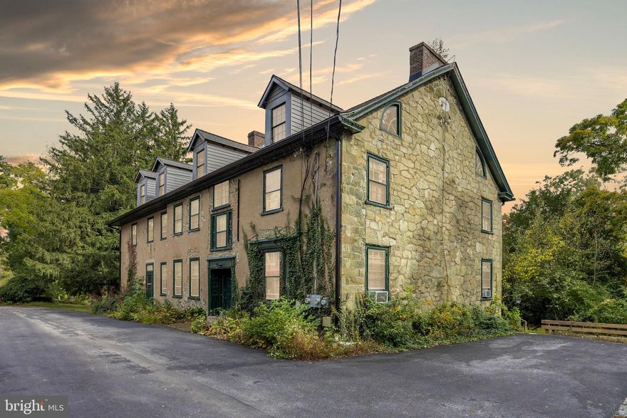 Take a stroll through history and visit this bucolic property in the much sought after West Chester area. 935 & 941 Pottstown Pike being sold together. Leave behind the hustle and bustle and experience this majestic estate, formerly known as Taylors at Didcot Property and also referred to as The Yew Tree Farm. Built in 1820, the first parcel, once a distinguished single family home, now used as a multi unit, can be converted back to a Single Family Dwelling or can continue to function as a 2 unit rental. The property has been carefully maintained and features a new roof. The second parcel -- a gorgeous, almost 7 acres -- features a stone bank barn built by a stonemason in 1821. The stone bank barn can also be converted into a single family dwelling. A pond and stream known as Taylor’s Run and an amazing waterfall right in your own backyard for you to enjoy!  The natural surroundings create a serene environment for tenants and guests alike.  There are no historic preservation limitations or restrictions on either parcel. Should a builder decide to just use the land on either parcel, the township currently has no restrictions on the land. There once was a schoolhouse on the property, facing the main road. It was called the turnpike at that time when it was a two lane buggy road. Between the history of the property, the water features, and the scenic beauty of the area, this unique opportunity should not be missed! Schedule your showing today and you could make this iconic West Chester property yours and make your own history. Public Records shows 941 Pottstown Pike, Tax ID 52-04-0010.0200 Total taxes for 935 and 941 Pottstown Pike are $9505 for 2024.