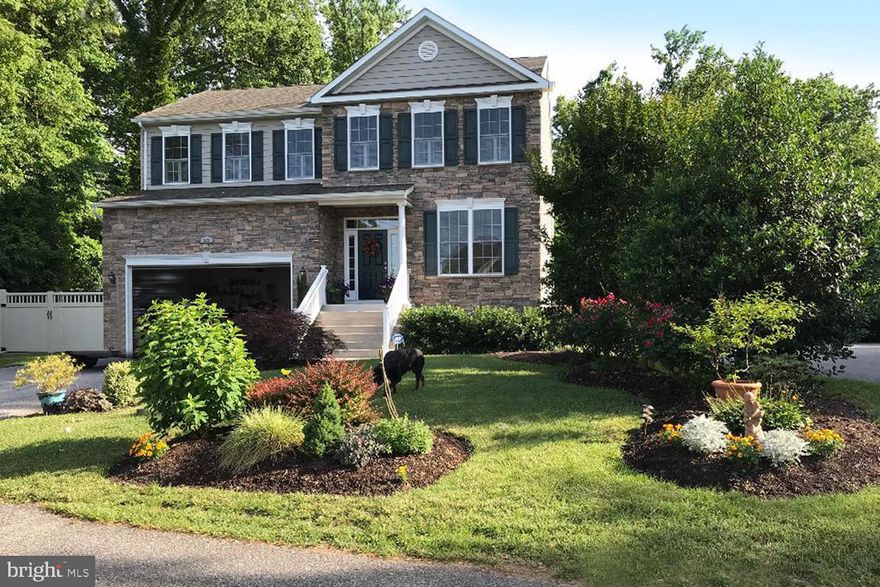 Stunning WATER VIEW colonial located on sought after street in Manhattan Beach surrounded by million dollar plus homes.  Newly constructed in 2010 and lovingly upgraded throughout the years. Backyard is amazing! Extensive hardscape with built in fire pit and gazebo. Gleaming hardwood floors throughout main floor.  Wonderfully designed built-ins in the family room. Designer tile in powder room and hall bath. Wonderful water views from the master bedroom and huge walk-in closet. Basement is nicely finished for man/woman/kid cave and is plumbed for full bath if desired. All of this and it is a super quiet cul de sac location!!  This is a tough find for Severna Park at this price point - don't hesitate!!!