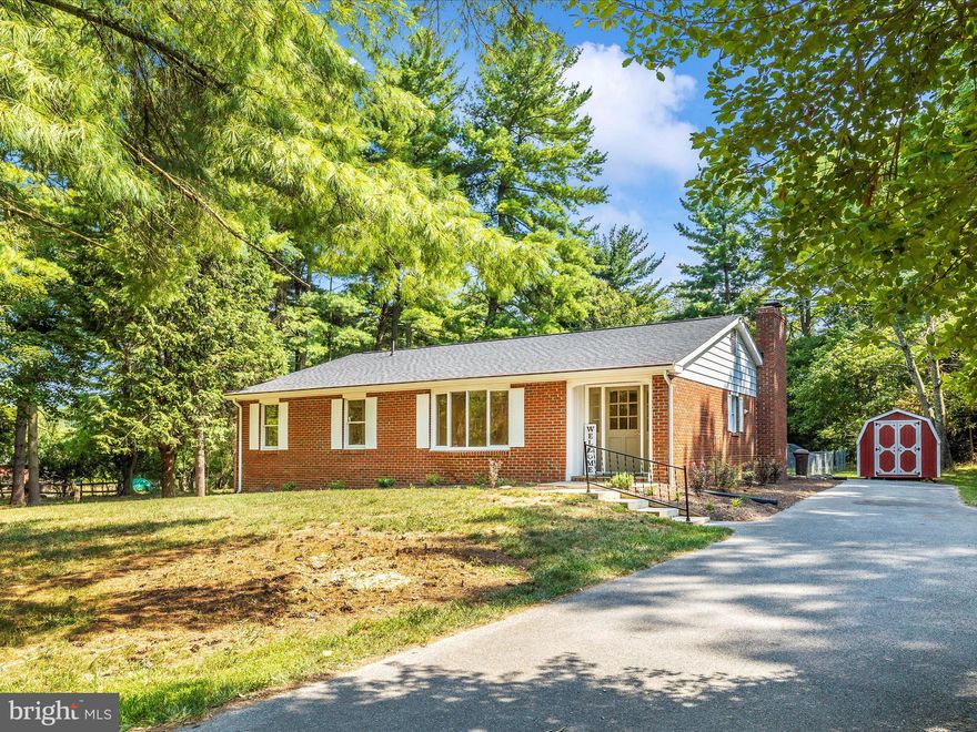 This adorable brick rancher is beautifully updated and located on almost 2 acres in the sought-after community of Horseshoe Bend.  Partially wooded and partially open and is currently being improved with some additional landscaping. Freshly painted neutral walls, bright white trim, and new "real" hardwood flooring.  One floor living with three nice sized bedrooms and two full baths.  The large screened in porch looks out over a fenced in area for the kids and/or pets to play.  The peaceful setting and views of wildlife are priceless.  Kitchen features new white cabinetry, granite counters, new appliances, and bar-seating from the family room.  This home boasts a formal living space, dining area and a nice sized family room with a wood-burning fireplace.  There are nice bay windows in both the front and back of the house.  Primary bedroom has a private bathroom with a double-sink where the washer and dryer are located.  Hall bath features a double-sink, large linen closet, and ceramic tile. The screened-in porch may be a favorite feature as it overlooks the fenced rear yard and has plenty of room for entertaining or quiet time. The lower level is huge, offers lots of storage, a work space and could be finished to add even more living space.  This lower level includes a nice sized room that has a large fireplace with insert.  There are new double French doors that lead out to a double-wide  stairwell to the side yard. Outside you will find a new 8' x 16' shed. The buyer can enjoy the 32 acres of community space along Antietam Creek for fishing, picnicking, camping, tubing, walking, and swimming. Property is a quick drive from major commuter routes, canal, Antietam battlefields, wineries, and so many other amenities. Note that a new roof and new Trane hvac with warranties are just a part of the many improvements.