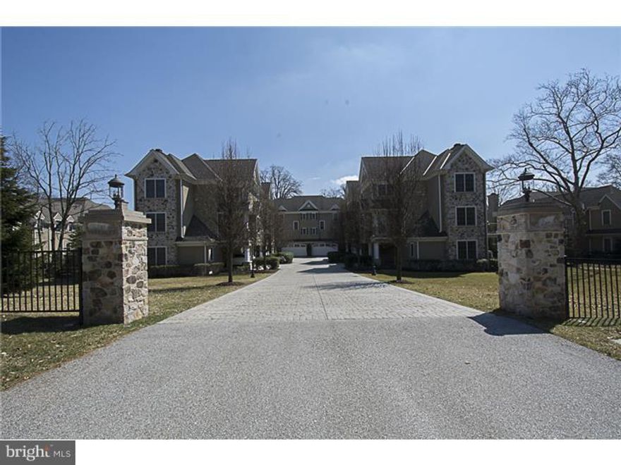 The coveted community appropriately named the terraces is an enclave of  6 very special homes.  Built by C.F. Holloway, a renowned Main Line developer.  This pristine and barely lived in carriage home is meticulously maintained. The impeccable finishes, furnishings and attention to detail make this truly move-in. The home is equipped with an elevator mirroring the Four Season. This home has 3 bedrooms and 3.1 beautiful baths. The main bedroom has ample closet space and a luxurious bathroom. The gourmet kitchen with custom cabinetry and high-end appliances show no signs of use. There is counter as well as table seating.  This home also offers a lovely den connecting to a balcony overlooking landscaped foliage. There is radiant heat in some surfaces as well as a 2 car attached garage with architectural carriage doors. The decks, patio and great windows allow wonderful natural light throughout. Beautiful hardwood floors, crown moulding, wainscoting and pristine condition coupled with the very low taxes makes this a home you'll want to own.