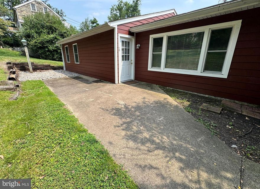 NEW PRICE AND MOVE-IN READY! Don't miss this fantastic rental opportunity. This recently updated 2 bedroom, 1.5 bathroom unit provides in-unit laundry, off street private parking and breathtaking views of the Buckingham hillside.  Catch the sunset from the large outdoor private deck or catch it inside from the updated kitchen: featuring newly refreshed cabinets and updated stainless steel appliances. Both generously sized bedrooms boast ample closet space, new blinds and ceiling fans. The primary bedroom has a convenient ensuite full bathroom. A half bathroom is located just off the kitchen, perfect for guests. Walkable to Peddler's Village, this unit is one you won't want to miss!