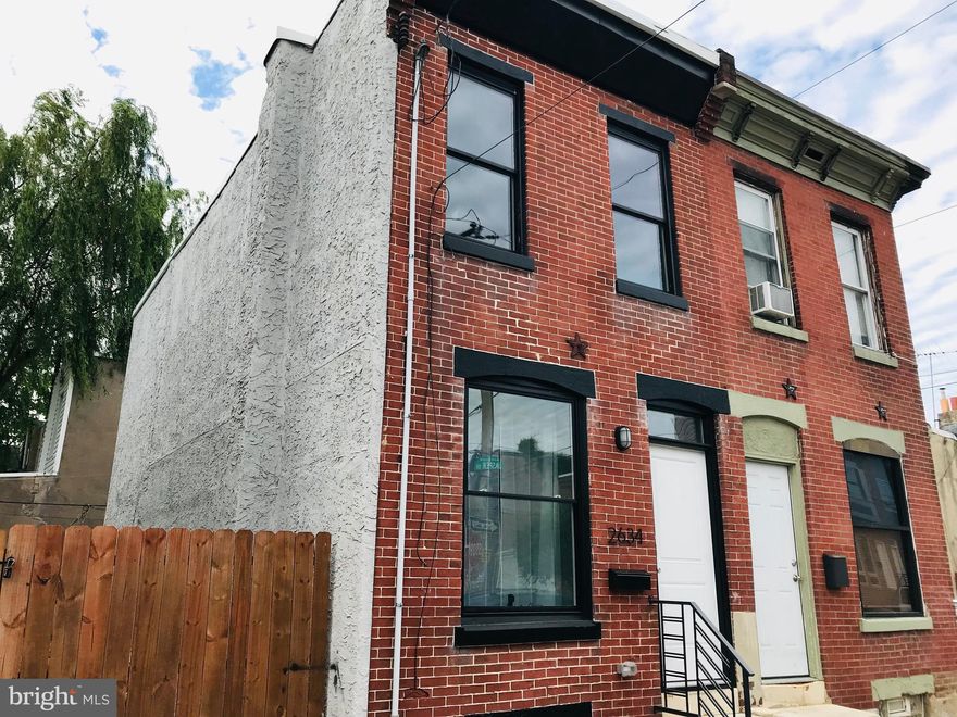 Whats affordable, has easy access to Center City, and is in one of Philadelphia's hottest neighborhoods? That's 2634 Jasper St!   Located in hot fishtown and only 2 blocks to the El Station, this outstanding Fully Rehabbed property should be on your must see list. You'll be wowed as soon as you walk in the front door by the beautiful hardwood floors. The first floor is an open concept layout with Living Room, Kitchen, coat closet and main level half bath. The all new kitchen boasts granite countertops, shaker style cabinets and all Stainless steel appliances including Refrigerator (with smart system), a 5-burner Samsung stove, dishwasher and disposal. Out the back you will find a large patio and a graded, seeded and fenced side lot for your enjoyment (Side Lot not included in sale).  Upstairs you will find hardwood floors throughout, two nice bedrooms with large closets and an all new main bath with walk-in all glass shower. It has great flow and great light.  Downstairs is a full clean basement.  Everything is new including Roof, Electrical, Plumbing, HVAC and Hot Water heater.