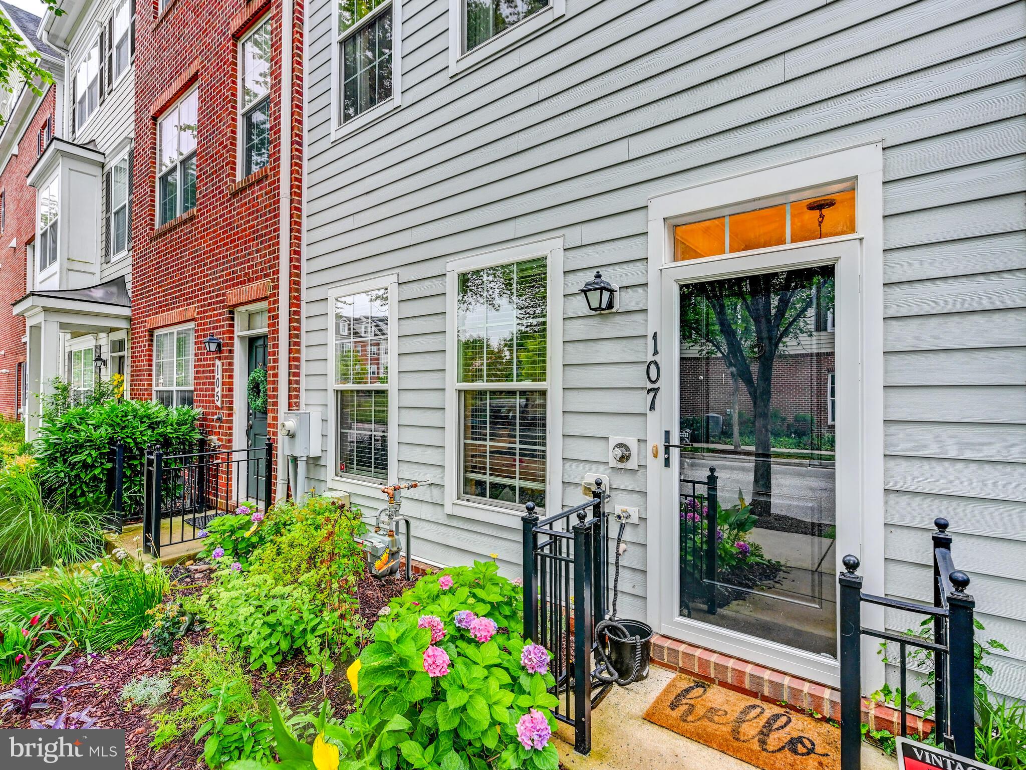 Welcome to this charming townhome located in the desirable Towson Green community. This well-maintained property offers comfortable living spaces, modern amenities, and a convenient location within Towson. This spacious townhome features an inviting interior with an open floor plan. The lower level includes a welcoming foyer that leads to a study/ bedroom and access to the 2 car garage with ample storage space. The second level is open concept, featuring a large living room with a gas fireplace & powder room, with dining area that flows seamlessly into the modern kitchen, equipped with stainless steel appliances, an abundance of cabinetry and access to the rear balcony. Upstairs are two well-appointed bedrooms and laundry. The primary bedroom boasts generous closet space and an ensuite bathroom for added privacy and convenience. The additional bedroom is equipped with a large closet and access to a hallway full bath. The sunlit upper level features a large family room/bedroom, full bathroom and access to the roof top balcony. Attached 2-car garage for ample storage and ease of parking. Situated in the sought-after Towson Green community, this townhome is conveniently located near a variety of amenities. Towson University, Goucher College, Whole Foods, and the Towson Town Center Mall are all within close proximity. The neighborhood offers easy access to major highways, making commuting a breeze. Enjoy nearby parks, shopping centers, restaurants, and entertainment options.