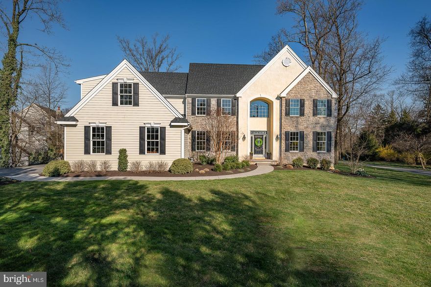 Welcome to 1475 Russell Rd, an exceptional home nestled behind mature evergreens in the highly sought-after community of Berwyn in top ranked Tredyffrin/Easttown School District. Enjoy the convenience of being walking distance to the Daylesford train station, with easy access to the city of Philadelphia. This spacious, comfortable and beautifully updated home with 9' ceilings on the main floor, offers a harmonious blend of modern elegance and timeless charm, boasting an array of luxurious features to suit every lifestyle. Spread across 4380 square feet, this meticulously designed home offers 5 bedrooms, 3 full baths, and 2 half baths, providing ample space for comfortable living and entertaining. Enjoy the gorgeous new hardwood floors throughout the first floor, while plush new carpets adorn the second floor, adding warmth and sophistication to the living areas of the home. As you enter this special home, you are greeted by the grandeur of the two-story entry hall showcasing an impressive staircase and beautiful new chandelier. The heart of the home - the open, recently updated gourmet kitchen - boasts stainless steel appliances, a large island with breakfast bar, pantry closet and flows effortlessly into the breakfast room, family room and sunroom - ideal for hosting gatherings or casual family meals. Marvel at the soaring ceiling in the family room, accentuated by a striking stone wood-burning fireplace, and numerous large windows that make this a very bright and cheerful space. The sunroom is a great bonus space and has a slider to the deck and charming stone patio with outdoor fireplace. The open formal dining and living rooms offers additional space for living and the convenient main floor office is perfect for working from home. Two powder rooms and the laundry/mudroom complete the main level. Upstairs you will find the expansive primary bedroom featuring dual walk-in closets and a lavish ensuite bath complete with two separate vanities, a jacuzzi soaking tub, and a beautifully tiled shower with a frameless glass enclosure. There is also another bedroom with ensuite bath as well as 3 additional bedrooms that share the hall bath on this level.  All baths have been tastefully updated and all bedrooms have new quality carpet and the entire floor is freshly painted. The expansive unfinished, walkout basement offers over 1,500 square feet of finishing potential, featuring high ceilings and providing endless opportunities for customization to suit your needs. Step outside to discover a picturesque backyard patio, perfect for al fresco dining or relaxing amidst the serene surroundings. Enjoy this seamless extension of indoor-outdoor living and the luxury of a flat and open yard. You will never have to worry about watering as there is an irrigation system in front and back. Don't miss the chance to experience luxurious suburban living at its finest. Schedule your private tour today and make this special home yours. Walk to Daylesford Train Station, Handels, and even downtown Paoli! Great location!!