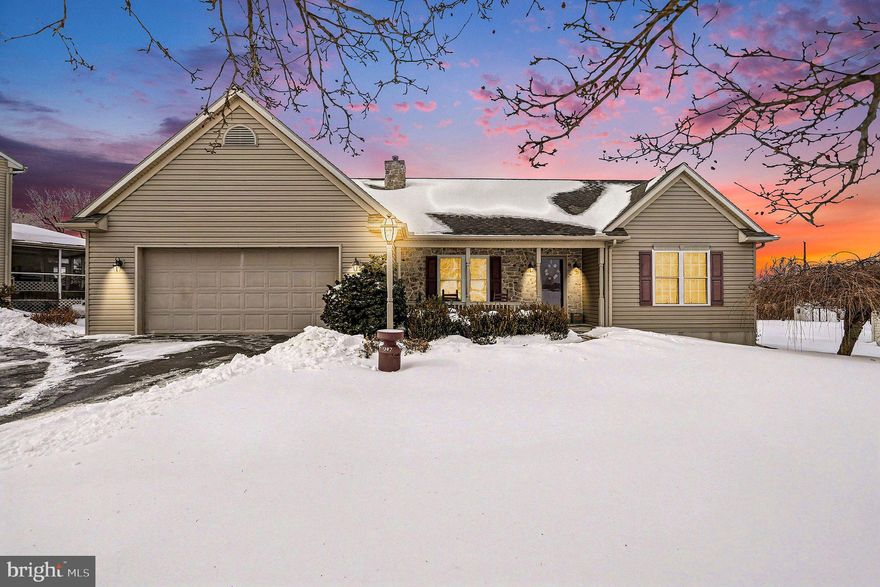 Step in from the welcoming, covered front porch overlooking the countryside and discover this well-maintained three-bedroom, two-full-bath rancher offering comfortable one-level living. The entryway opens to a well lit, front living room, highlighted by a stone, propane fireplace with an owned propane tank, perfect for relaxing evenings at home.

The spacious kitchen offers ample cabinetry and a convenient pantry, open to the dining area and a bright sunroom that overlooks the backyard—an ideal spot to enjoy your morning coffee or unwind at the end of the day.

The primary bedroom suite provides a comfortable retreat with a walk-in closet and a well-appointed en-suite bath featuring a Jacuzzi tub, walk-in shower, and double vanity. Two additional bedrooms, a second full bath, and first-floor laundry complete the main level.

Downstairs, the partially finished basement includes a propane space heater and offers endless potential—ready for your personal touch to create additional living, hobby, or entertaining space.

Outside, relax and entertain on the back deck just off the sunroom. A shed provides extra outdoor storage, while the two-car attached garage adds everyday convenience.

A perfect blend of comfort, functionality, and serene country living - this rancher is ready to welcome you home!