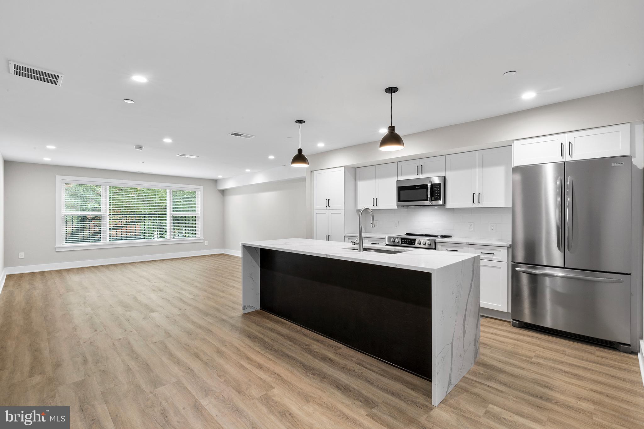 Welcome to 2146 Lombard Street!
Enter from Lombard Street through your private entrance and into this beautifully renovated 2 Bedroom 2.5 Bathroom + Den townhome for rent. Approximately 1700 Sq Ft. The open living space features a gorgeous kitchen with waterfall quartz counters, a huge island and a great size living and dining area. An oversized window with southern exposure makes this space bright. Around the bend is your den and powder room, ideal for a home study or office. Head upstairs and you'll find two large bedrooms with three closets each and oversized windows. Each bedroom has a luxurious en-suite bathroom. Bathrooms feature dual vanities with quartz counters, one with a tub/shower and another with a large standing glass shower. Your laundry is on the 2nd floor. 1 CAR FREE PARKING is included and is located in the rear of the building.
Live in the heart of Fitler Square - This building has a Walkscore of 98! The nearby options for restaurants and cafes are endless. Live steps from the Schuylkill River Park and Trail. This is a true GEM in Fitler Square.