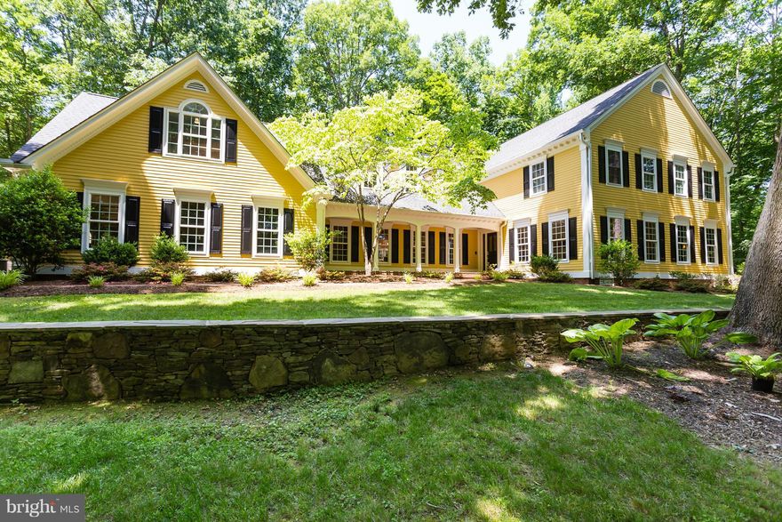 One of a kind Beauty built with style and grace situated on an 8 acre park like setting. Exquisite craftsmanship shines through this 5200+ sq feet home w/ gourmet kitchen- Granite, SS. Vaulted Ceilings w/ skylights. Remodeled master bath w/ huge w/i shower, heated tile floors & double sinks. Hardwood floors consume the entire house. $40k HVAC upgraded system. Sprawling deck + screened in porch.