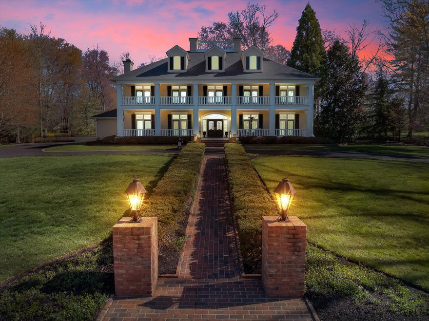 Sweet Home Gwynedd Valley! Welcome to the truly one-of-a- kind 950 Pennbrooke Lane. This exquisite southern inspired manor home offers an unparalleled blend of luxury and comfort on one of Gwynedd Valley's most coveted streets. The home was a custom design that was built in 2000 by Philomeno & Salamone for the current owners. Spanning over 2.2 acres includes the adjacent lot in the sale.  Step inside to discover a meticulously designed interior with four floors of living space that features six spacious bedrooms and four full bathrooms, complemented by two elegant half baths. The downstairs has an open floor plan that is adorned with crown moldings, hardwood floors throughout, custom built-ins, wainscoting, and a cozy gas fireplace in the kitchen eating area perfect for gatherings. The gourmet kitchen is equipped with high-end appliances, including a built-in range, wall oven, two dishwasher, subzero fridges and flows seamlessly into the dining area that is ideal for entertaining. Outside, enjoy multiple balconies that includes a two-story front porch that overlooks the circular driveway, an enormous back patio with extensive hardscape, more covered porches, and lush landscaping. The three-car side-entry garage provides ample storage with a built in EV charger. Experience the exclusive lifestyle this remarkable home offers, where luxury meets everyday living.
