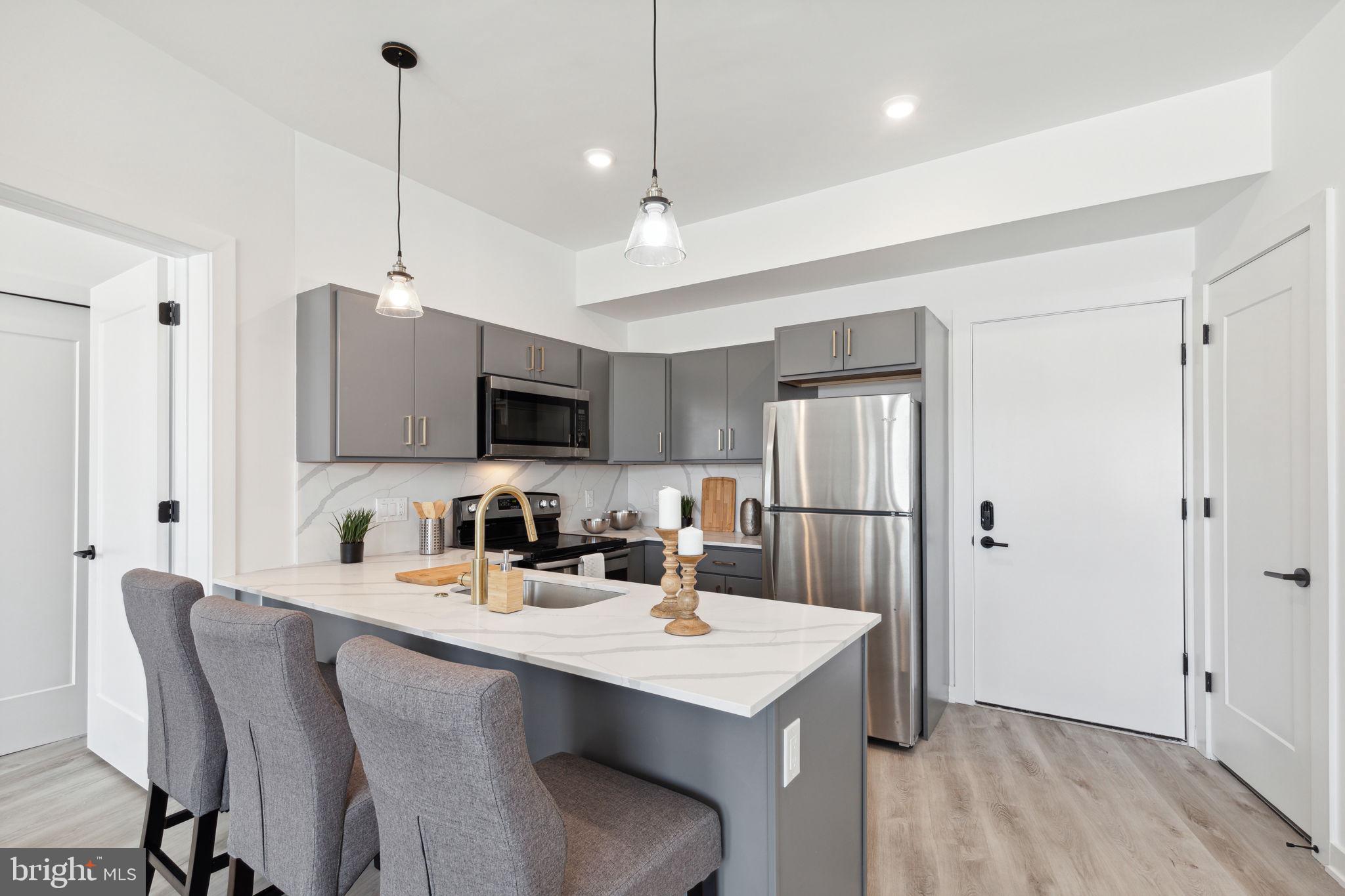 Available Early June | Leasing Special: 1 month free for a 13 month lease - $1,725/month gross rent, $1,592/month net effective rent.
Welcome to Penn Reading! This gorgeous, professionally managed building is the perfect place for you to call home! Modern features collide with convenient living in these spacious 1 and 2 bedroom apartments, located in vibrant East Kensington. You’re sure to love the luxurious lobby showcasing an elevator and 2 separate stairwells for easy and secure access in and out of the building. An Amazon Digital Key Delivery Access ensures your packages will be delivered inside the building for added peace of mind. Conveniently equipped with central a/c for year-round comfort and in-unit laundry, each unit was custom engineered to offer peace of mind and well-being. Unit #5C is a 2 bedroom, 2 bathroom apartment on the 5th Floor with a bright and spacious interior bursting with sleek fixtures throughout. The open floor plans provide a bright and airy atmosphere and ample room for you to customize your furniture arrangement. Enjoy kitchens that have never been used before and are fully equipped with cabinetry above and below, marble counters and backsplash, and sleek stainless steel appliances. Large windows offer abundant sunlight throughout and the bedrooms are sizable with sliding closet doors. The elegant bathrooms boast modern fixtures and lighted vanities with storage space. This beautiful rental won’t last long – call today to claim this gem as your own! Please note: photos & video tour are from a similar unit within the building; exact layouts and finishes may vary.
Lease Terms:
Generally, 1st month, 12th month, and 1 month security deposit due at, or prior to, lease signing. Other terms may be required by Landlord. $55 application fee per applicant. Pets are conditional on owner's approval and may require an additional fee, if accepted. (Generally, $500/dog and $250/cat). Tenants responsible for: electricity, cable/internet, and flat water fee ($35/month for 1bed, $55/month for 2bed). Landlord Requirements: Applicants to make 3x the monthly rent in verifiable net income, credit history to be considered (i.e. no active collections), no evictions within the past 4 years, and must have a verifiable rental history with on-time rental payments. Exceptions to this criteria may exist under the law and will be considered.