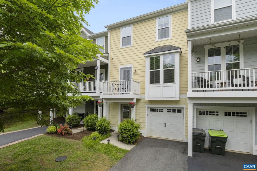 OPEN HOUSE Friday 5/17 12-2PM and Sunday 2-4PM. Beautifully maintained Crozet townhouse for under $400K - welcome to 1497 Wickham Pond Dr.! Step inside to a welcoming foyer that leads into a versatile rec room, ideal for a home office, workout space, or guest room. The upper two levels feature updated high-quality LVP flooring, extending into the bedrooms. Tall ceilings allow natural light to fill the main level. The open-concept kitchen boasts stainless steel appliances, granite countertops, a generously sized island, and ample dining space. Enjoy outdoor living with a sunny front porch, a back deck with a retractable awning, and a fenced-in backyard. The primary suite upstairs features a tray ceiling, a walk-in closet, and a bathroom with a glass shower and accented tile. Additional storage is available in the 1-car garage. Wickham Pond offers amenities for easy living, including an exercise room, trail system, clubhouse, play area, and comprehensive exterior maintenance (roof included!). This well-established neighborhood is a Western Albemarle sweet spot, just minutes from downtown Crozet and 15 minutes to Charlottesville.,Granite Counter,Wood Cabinets