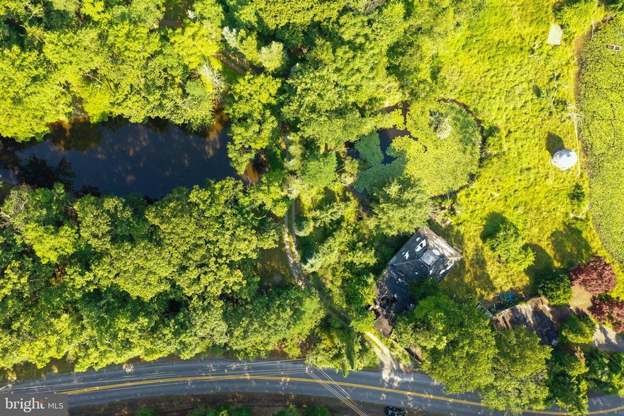 BEST AND FINAL OFFERS DUE ON MONDAY, JULY 17TH AT 3:00 PM.  Don't miss the opportunity to own 7+ acres with cascading ponds consisting of 2 parcels, 1.93 acres and 5.38 acres located near The Woods. This unique property was previously owned by skilled artisans in the stained glass business for years. Build your dream home in a setting of natural habitat for wildlife

Buyer will have first right of approval to purchase the adjoining parcel consists of 5.29 acres.

The property is for residential purposes only. No commercial activity shall be permitted. No mobile homes, trailers, campers, recreational vehicles (Rvs) shall be situated upon the Subject Property, at any time as a residence or for storage, either temporarily or permanently and nor more than one residence shall be situated upon the Subject Property, in total. Being sold in "AS IS" condition