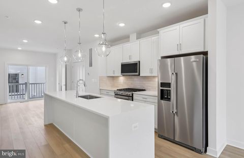 Photo of 3057 Nina Clarke Drive, ROCKVILLE, MD 20850 (MLS # MDMC2214494)