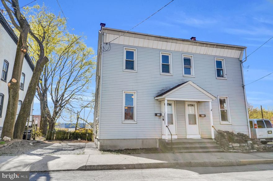 This cute home would be a great rental/ investment property as well as an owner occupied.  Located in the heart of Hamburg offers updated modern Living room , Dining room, Kitchen and 3 Bedrooms and a 2nd floor walk in closet which is very unique for a home of this age.  There is also a nice main floor laundry area/rear porch and some off-street parking and a rear yard for relaxing.  This was a rental for many years previously.   Rent it out again or Make it your home!  The seller is also providing a 1 year Home Warranty for the buyer at settlement