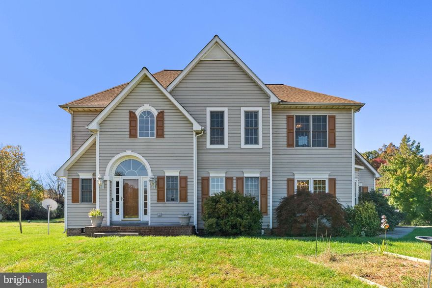 Discover the ultimate escape at 173 Ashland Drive, an elegant and expansive residence perfectly situated on over 3 stunning acres. This home offers a true sense of seclusion, set far back from the road to ensure maximum privacy and tranquility, all while being in a superb Winchester location. Step inside the striking two-story foyer, immediately setting a tone of spaciousness and sophistication. The main level, with its exquisite hardwood floors, is illuminated by abundant natural light. Elegant formal spaces abound, such as a formal living room and a dedicated formal dining room, ready to host dinner parties. The home’s design is perfect for both grand entertaining and comfortable daily life, featuring impressive architectural details like vaulted ceilings that enhance the open feel. The heart of the home is the bright, well-appointed kitchen, which flows seamlessly into a sun-drenched breakfast room—the perfect spot for casual meals. The adjacent family room provides a warm and inviting gathering space, centered around a cozy fireplace for those crisp Virginia evenings. The main level also offers exceptional flexibility with a large bedroom with private outdoor access, perfect for an in-law suite, home office, or guest quarters. Upstairs, the sprawling primary bedroom suite is a luxurious retreat. Featuring elegant tray ceilings, it is flooded with natural light and includes a dedicated sitting area ideal for relaxation. Storage is never an issue with the massive walk-in closet, designed to handle the most extensive wardrobe.The spa-like ensuite bathroom completes the sanctuary, featuring a lavish soaking tub, a separate glass-enclosed shower, and dual vanities that provide ample counter and storage space. The thoughtfulness of the design extends to the rest of the upper level, as all secondary bedrooms are of generous size, ensuring comfort for family and guests alike. This truly ideal floor plan provides ultimate convenience and privacy with every bedroom on this level offering an adjoining bathroom, providing a suite-like experience throughout. Beyond the interiors, the home is an entertainer's dream. Step out onto the large rear deck, an ideal spot for enjoying the peaceful surroundings. This expansive outdoor space features built-in bench seating, perfect for summer BBQs and alfresco dining, all while overlooking the level backyard—a fantastic space for games, gardening, or simply enjoying the three-plus acres of privacy. For all your lawn care equipment, tools, and seasonal items, the property includes two practical outdoor sheds, providing convenient and accessible storage. This exceptional property offers the rare combination of a private, country-like setting with easy access to all the amenities Winchester has to offer.