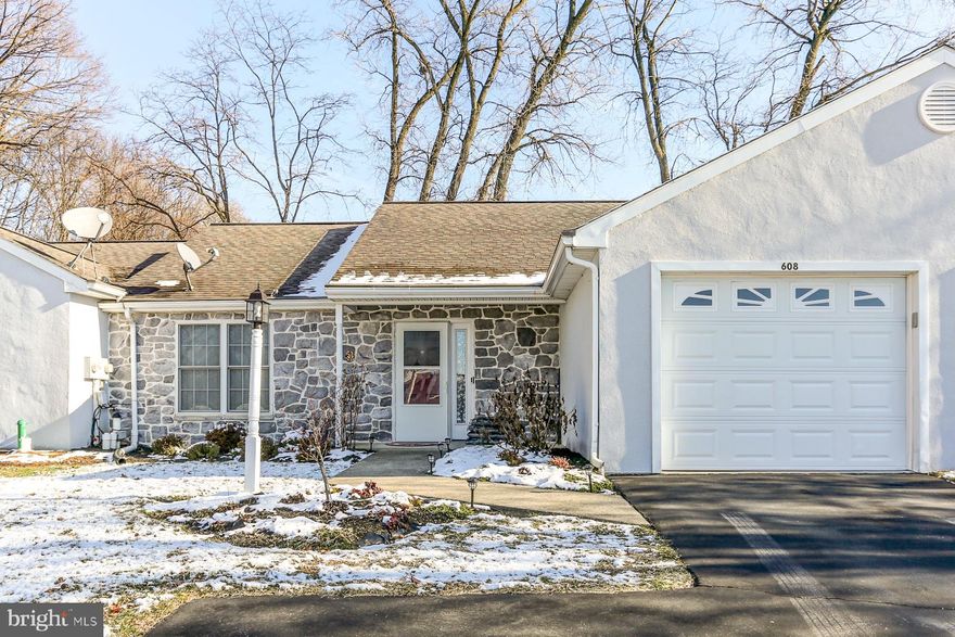 Welcome to this stunning home in a vibrant 55+ community, where comfort and convenience meet effortless living. Step inside to discover an open floor plan boasting luxury vinyl plank flooring and a modern kitchen with sleek stainless steel appliances. The spacious sunroom, featuring vaulted ceilings, invites you to relax and bask in natural light.  Enjoy two generously sized bedrooms designed for comfort and flexibility. This home is equipped with natural gas heating and additional insulation, ensuring year-round energy efficiency.  The affordable monthly HOA fee covers sewer, water, trash, yard care, and snow removal, providing a truly maintenance-free lifestyle. Don't miss this opportunity to experience easy living in a well-maintained community!