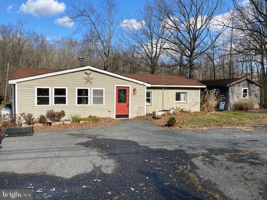 Needs major work. Possible structural damage in both bedrooms. 2 bedroom, 2 full bath home situated on over a half acre of flat land. Some updates to include the kitchen, flooring, and bathroom. Oversized driveway for extra parking and a large shed/garage for storage. Contingent on 3rd party lender approval. Sold completely as is. Seller will make no repairs. Cash or 203k financing only. Buyer must give 90 days for short sale approval.