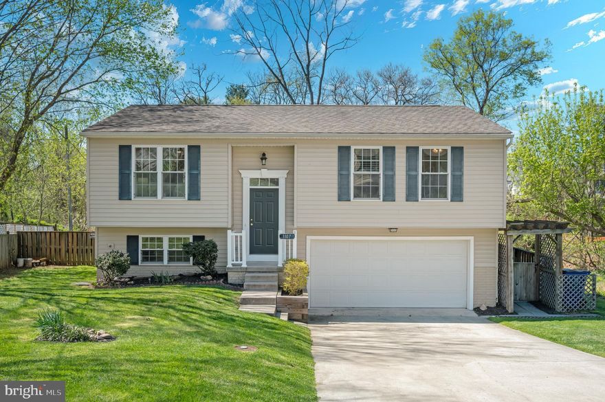 Welcome home to 1107 2nd Avenue - a move-in ready gem in Brunswick, Maryland! Built in 2010, this thoughtfully designed split-foyer home offers 1,800 sq ft of finished living space across two levels, featuring 3 bedrooms, 3 full bathrooms, an oversized 2-car garage, and a fully finished lower level - all with no HOA. Step inside to gleaming hardwood floors on the upper level, neutral fresh paint throughout, and an open floor plan flooded with natural light. The kitchen delivers stainless steel appliances, ample counter and cabinet space, and an adjoining dining area perfect for everyday living and entertaining. Three bedrooms upstairs include a primary suite with its own full bath, plus two additional bedrooms served by a hallway bath. The lower level is fully finished with a large open recreation space, a third full bathroom, laundry area, and direct walkout access to the oversized attached garage. Outside, the composite deck with freshly stained deck railings offers the perfect perch to overlook a private, flat, and fully fenced backyard offering hardwired outdoor speakers already in place. Cool off and enjoy summertime fun in the recently installed above-ground pool enhanced by a circular sitting wall that creates a welcoming space for relaxing and gathering. Professional lawn service with fresh mulching and trimming completes the picture. Just steps away in the adjacent 2nd Ave Park, there is a playground and a brand new basketball court to extend your fun. The East Wenner Branch Stream Restoration Project is currently underway right next door. Upon its anticipated Spring 2026 completion, the project will deliver a restored natural creek, freshly planted native trees, and a walking path, essentially adding a nature trail as your backyard neighbor. Yes, there's active construction now, but the finish line is close for you to enjoy for years to come. Additional amenities include New HVAC (April 2023), energy-efficient double-pane windows, and 6 total parking spaces. Only minutes to 2nd Avenue Park, the Brunswick Library, and Walgreens, and conveniently located from the Brunswick MARC train station (60 minutes to DC), the Potomac River and rafting, C&O Canal hiking and biking trails, grocery stores, and the VA/WV border. This one checks every box - inside, outside, and beyond the backyard.