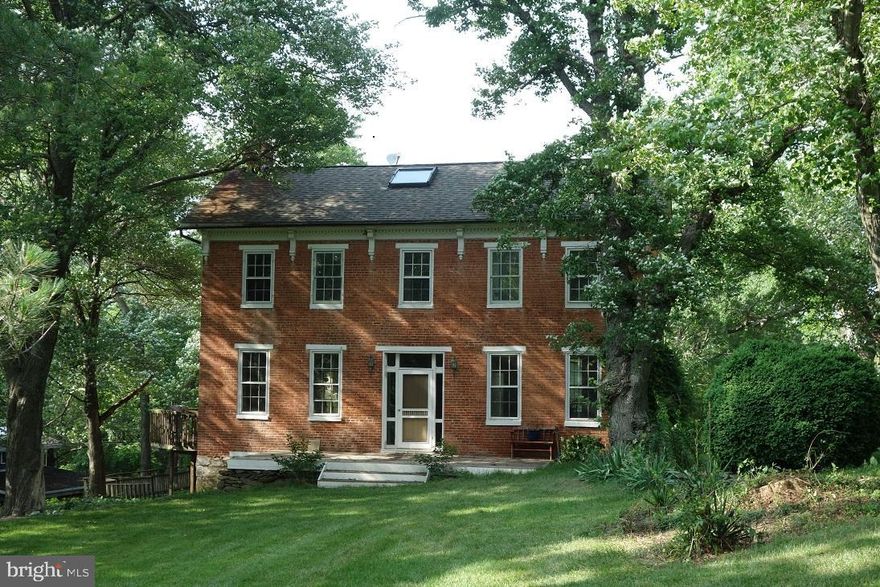 Unique opportunity ...  Distinctive brick residence sited on 8 secluded private acres, peaceful and bucolic.  Captivating views. Dating from the mid-late 19th century (1850-1900), this residence has been updated over the past 40 years all the while retaining the old house feel of the Civil War era . Kitchen and systems updated.  Decks, balcony, and flagstone patio adjacent to stone wall and garden. Flexible floor plan, enormous expansion potential or new build.   

Of particular note, there  is a separate 2-story accessory dwelling with inviting light-filled 2nd floor apartment. A workshop on 1st level includes a wood stove that heats the entire building.  Ask listing agent for more details.

The water for the house is sourced from an artesian well.  Described by the owner as the best water ever! The property is zoned agriculture and surrounded by farmland ... just consider the variety of possibilities! Mature trees everywhere providing shade for both structures. When leaves are in full, no lights are visible from anywhere.  Abundant wildlife including a beautiful resident peacock who regards the property as home and would like to stay put.

 With its  quiet pastoral setting, this property evokes the quiet beauty of rural Vermont. Yet, it is remarkably convenient - south of Urbana, minutes to  I270 just off Route 355 in southern Frederick County. Easy access to Montgomery County and the greater DC Metro area.  Whether you're seeking a private retreat, a country estate, a classic with modern potential or an opportunity to fulfill your own unique vision, you need look  no farther.