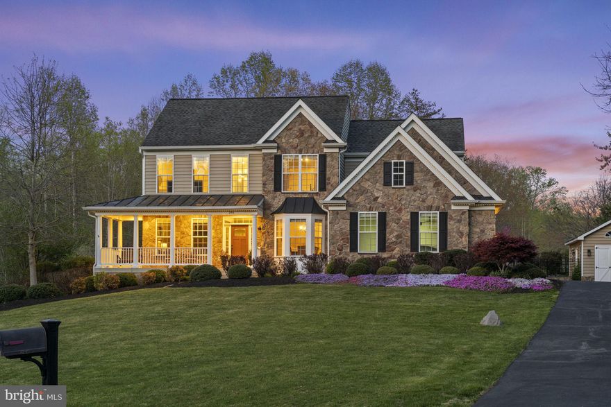 Welcome to 264 Toluca Road in the heart of Stafford County! This beautiful home is nothing short of stunning offering you the best of both worlds tucked away on over 3 private acres on a cul-de-sac lot and just minutes off Garrisonville Road and convenient to shopping, schools, and I-95. At the end of a long day, imagine looking forward to driving up the expanded driveway offering loads of parking, and taking in the breathtaking phlox & professional landscaping of this breathtaking home. The inviting front porch ushers you through a gorgeous, wooden, front door where you will continue to be amazed at all this house has to offer. An open, two-story foyer w/ a brand-new stylish chandelier is just the first of many beautifully appointed updates in this well-cared-for home. New refinished hardwood floors throughout the entire main level, stairs and upstairs landing. This home also offers a dining room & living room with custom moldings and rounded corners. The hall bath features beadboard, new fixtures and a well-appointed sink.   The oversized family room features a stone gas fireplace with a one-of-a-kind custom-made solid wood mantle and lots of windows for wonderful, natural sunlight. The open floor plan allows ample space for family movie nights or entertaining while the spacious corner office makes it easy and comfortable to work from home. The kitchen has been newly updated, w/ custom cabinet paint, hardware, new granite, and pendant lighting; it also features an upgraded stainless fridge & a double wall oven. The large, walk-in pantry will inspire any cook w/ the main lvl laundry conveniently only steps away w/ freshly painted, built-in cabinets & a utility sink. The cozy sunroom will have you spending many days & nights in intimate gatherings, relaxing, reading a book or just gazing out over the beautiful garden, pool, and pastoral yard. This favorite room leads out to a massive screened-in patio where you will enjoy many summer and fall nights with family & friends while listening to the luring sounds of the pool's waterfalls or the cadence of birds offered by the peaceful setting in which this house sits. Take advantage of impromptu dips in the extra-large saltwater pool w/ a diving board, water fountains, & built-in pool seating while night swimming offers added ambiance of multi-color lights & loads of privacy. The backyard is fully fenced w/ additional property to explore beyond the fence line, including a beautiful creek running along the property & a quiet trail. As you head up to the bedroom floor convenient built-in bookcases greet you as you reach the top of the stairs, and large, open hallway leads to generous-sized bedrooms, all w/ ceiling fans & new carpeting. The hall bath boasts fresh paint, brand-new flooring, hardware, & coveted double sinks. The Primary Suite in this stunning home exceeds expectations with its massive size, vaulted ceiling, double walk-in closets, a large sitting area & a beautiful view of the expansive, private lot. The primary bath has a double vanity, new luxury vinyl flooring, a separate shower, & a deep soaker tub. Finally, head downstairs to the fully finished basement where you will be greeted with a large wet bar & another spacious open area perfect for entertaining or home gym space. Watch movies or call it a night in the 5th or 6th bedroom. The 5th bedroom has its own full attached bathroom-perfect for in-laws, teens, or even an Au pair suite. The 6th bedroom has a huge closet or use as a media room.  Head down to the creek dock & watch the gentle lapping of the water below!  Hop on your ATV and hit the well-maintained trail that runs behind the house!  Gather around the lovely fire pit on a relaxing summer evening!  Other features include newly painted finished garage, new custom paint & carpet, a spacious, custom-built shed w/ electricity Newer HVAC units,  whole-house water filtration system,whole-house hospital-grade HEPAA filter! Won't last long! So much to offer!