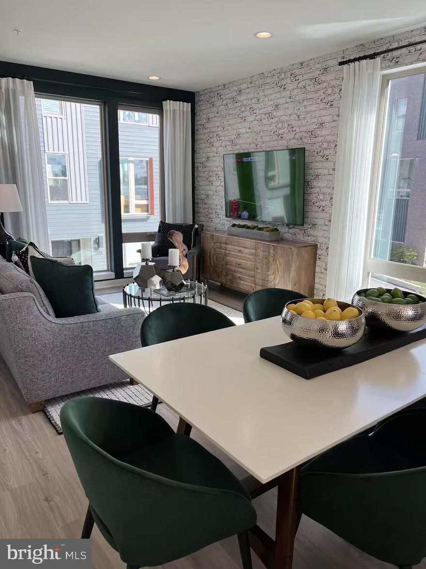 Welcome to North Bank, one of Philadelphia’s most sought-after riverfront communities. This stunning 3.5-year-old home is truly a dream come true, offering modern luxury, thoughtful upgrades, and an unbeatable location just steps from the Delaware River. Enjoy scenic walking trails, peaceful water views, and front-row access to fireworks on New Year’s Day. With 6 years of tax abatement remaining, you’ll also benefit from significantly reduced real estate taxes.

The entire home has been freshly painted, and the oversized one-car garage has been fully finished with drywall and paint—no exposed studs or rough surfaces. This home features countless upgrades throughout, including premium flooring, upgraded stairs, high-end appliances, and more.

As you enter through the modern matte-black door with stainless hardware, you are greeted by the first-floor flex space—perfect for a home office or gym—with a window overlooking the community. Access to the large garage is located on this level, offering ample room for your vehicle plus storage.

The second floor boasts an open-concept living area with a contemporary kitchen featuring an island, stainless steel appliances, and sleek cabinetry. The spacious living room is ideal for entertaining guests or unwinding after a long day.

On the third floor, you’ll find two generously sized bedrooms. One bedroom includes its own private ensuite with a dual vanity and a soaking tub—perfect for relaxing evenings. The second bedroom offers great space and ample closets.

The top floor is dedicated to the primary suite, featuring his-and-hers closets, a beautiful bathroom with dual vanity, and a walk-in shower. The primary bedroom also offers direct access to a large private balcony with captivating views—a true retreat.

Located minutes from Center City, Penn’s Landing, the Benjamin Franklin Bridge, and major highways, this home delivers both convenience and lifestyle.

Schedule your tour today—you will not be disappointed!