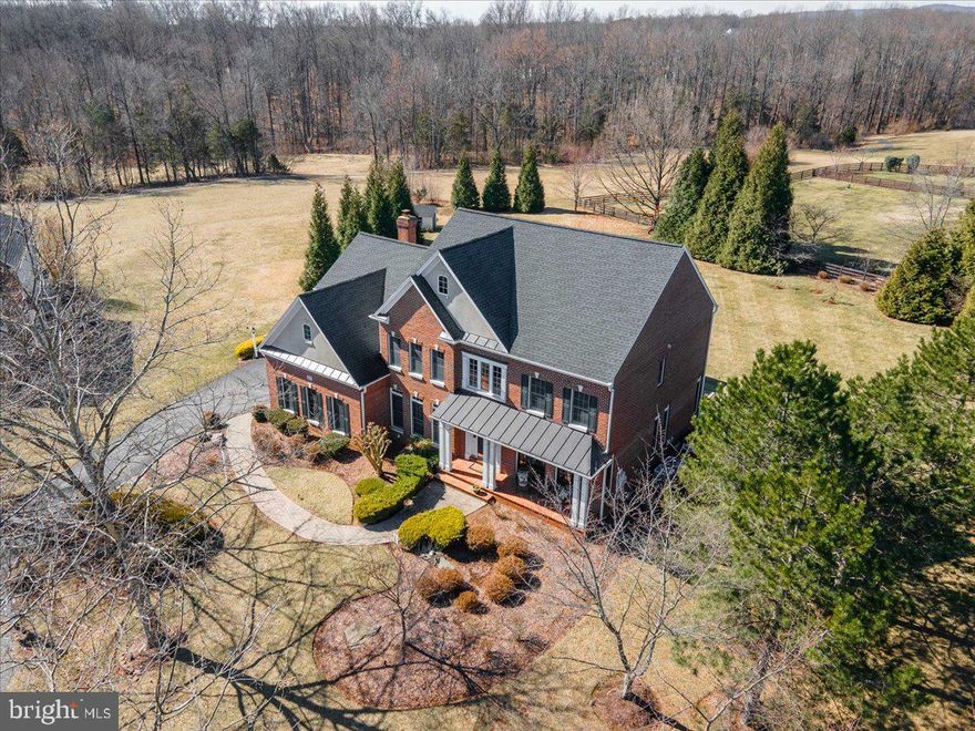 Simply dazzling! No amount of words or pictures do this home justice  You absolutely need to see it in person to appreciate the level of luxury and quality. From the minute you step inside, you will be in utter awe. Once inside you are greeted by the grand 2-story entrance foyer & gleaming hardwood floors.  Fully renovated, 5 bedroom.4.5 bathroom, 3-sided brick, 3 car garage estate home in one of Loudoun County’s most sought after communities, Lenah Run.  This former model home by Winchester Homes was built with every builder structural option offered including a light-filled solarium off the renovated gourmet kitchen and bump outs/extensions in every room, taking the total square footage to over 6,000 square feet.  
All of this situated on a picturesque and private .92 acre acre cul-de-sac lot allowing you to fully enjoy your large composite deck, patio &fire pit maybe even a future in-ground pool if you desire allowing for complete daily/nightly decompression from life’s stresses.  
The current owners have spared no expense investing over $200,000 renovating every area on every level.  Some of the beautiful change outs include (but not limited to): 2013 - New AC/Furnace Units - All 3 Systems, 2024 Replaced Hot Water Heater/Copper Piping, 2016 - Roof Replaced - Upgraded 5 Inch Gutters & Downspouts, 2020 – Chef’s Dream Kitchen Renovation With Tile Flooring, Quartz Counter Tops, & Marble backsplash 2025 – BRAND NEW Owners Spa Bath With Stand Alone Bathtub, Enlarged Shower With Marble Flooring & Vanities With Lighted Mirrors, Expansive Owners Suite With Built-In Fireplace & TV & Custom Container Store Closets, 2022 – Walk-Up Basement Renovation With Legal 5th Bedroom With Egress Window, LVP Flooring, Gorgeous Built-ins With Fireplace & Renovated Full Bathroom With Walk-In Shower, 2025 - Princess Suite With BRAND NEW Full Bathroom With Walk-In Shower With Marble Flooring & Vanity With Lighted Mirror, 2018 Renovated Jack & Jill Bathroom, 2023 New Composite Deck, Paver Patio, Outdoor Firepit, 2015 – Family room Fireplace Gas Logs Replaced

When you entertain, your guests are going to be overwhelmed by the elegance and grace this home offers.  There is room for as many people as you can invite to mingle, chat and simply enjoy themselves.  This home begs to be enjoyed by all who enter.  It is truly the crem-de-la-crem and by owning it you will be the envy of the community.

Lenah Run offers its residents the best of everything including acres and acres of green space, woods, creeks, community pool, walking trails, tot lots, special community events and so much more.  Ideally situated close to major commuter routes, shopping, professional centers, top Loudoun County schools, wineries, breweries and distilleries.