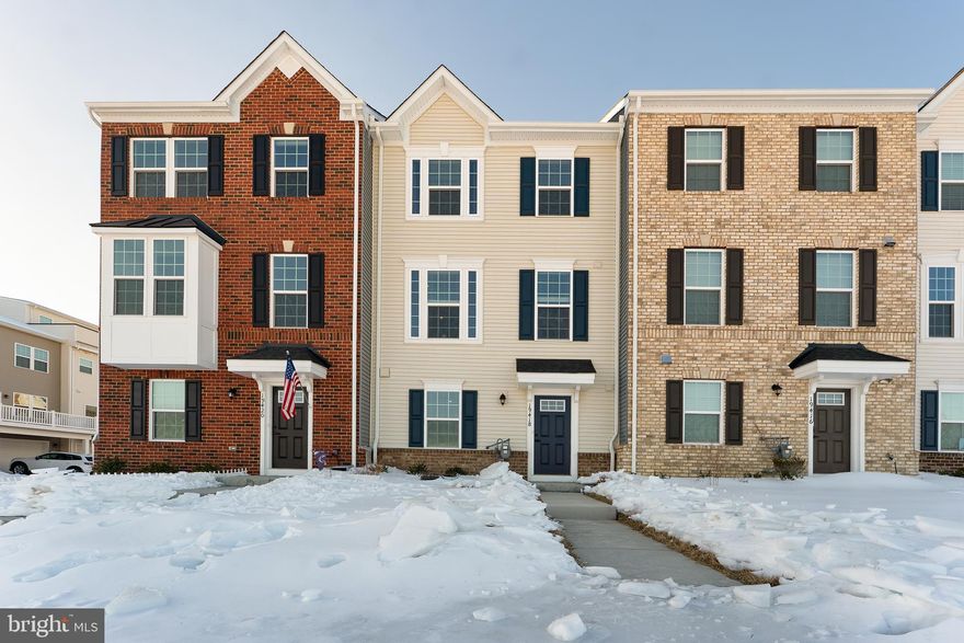 Like new condition 4 level townhouse at Tuscarora Crossing Community, only 1.3 miles from the Village at Leesburg, Loudoun County’s favorite destination to shop, dine and play. It has 5 Bedrooms, 4 full Bathrooms, 2 half Baths and 2 car garage with a long driveway for additional parking spaces. There also are unassigned parking lots in common area for guest/party. A cozy and natural light filled main level with luxury vinyl plank flooring will impress you with the open concept layout, combining kitchen, dining room and living room to maximize social interactions. Kitchen has stainless steel appliances, Quartz countertops and Breakfast Bar.  From the dining area, a sliding door leading to a free maintenance Trex deck overlooking the community. Recessed lighting throughout the house.  Dual-zone HVAC systems.
This particular property has a Bedroom with a full Bathroom on ground level, only a few steps from the main entrance/garage. On the top, there is another spacious Bedroom with a full Bathroom and a private Rooftop Terrace. It can be used as a guest room, home office, or an entertainment area. The Master Bedroom has a large walk-in closet and a luxury Master Bathroom with double vanities, soaking tub and a shower.
A lovely home in desired area, 1.3 miles to Wegmans, LA Fitness, CMX Cinemas, Lucky Strike Entertainment, The Dell...more than 75 boutiques, restaurants and entertainment experiences of The Village at Leesburg are waiting for you.