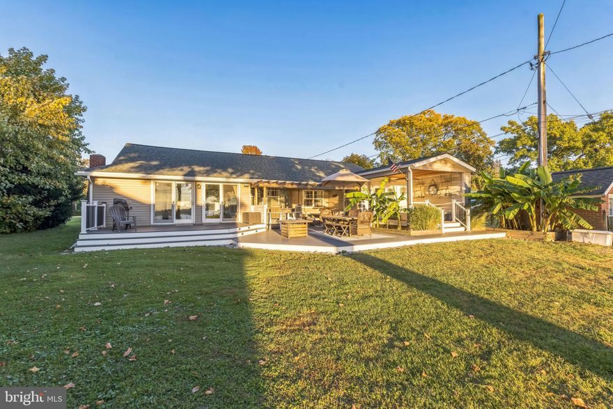 Nestled in the highly sought-after Long Beach Estates, this 3-bedroom, 2.5-bath home offers an exquisite blend of comfort, style, and deep waterfront luxury. Sitting on high ground—a rare find in Bowleys Quarters—this property requires no flood insurance, adding exceptional value and peace of mind. Inside, the home is bathed in natural light, with generously sized rooms creating a warm and inviting atmosphere. Step outside to an expansive yard, perfect for relaxation and recreation. The new roof (2023) and insulated crawl space ensure energy efficiency and long-term durability. For those who love outdoor living, this home is an entertainer’s dream! Enjoy the 12x12 covered waterside porch, an impressive 900 sq. ft. of Trex decking with a built-in bar—perfect for hosting gatherings, watching the Middle River fireworks, or taking in the lighted boat parade. The pier is fully equipped with water and electric and features two boat lifts (12,500 lb & 2,800 lb boat lifts),  and a huge 600 sq. ft. pier platform, with very deep water, you can fit any size boat of your choice, making it ideal for boating enthusiasts. Don’t miss this rare opportunity to own a waterfront gem with unmatched views and amenities. Schedule your private showing today!