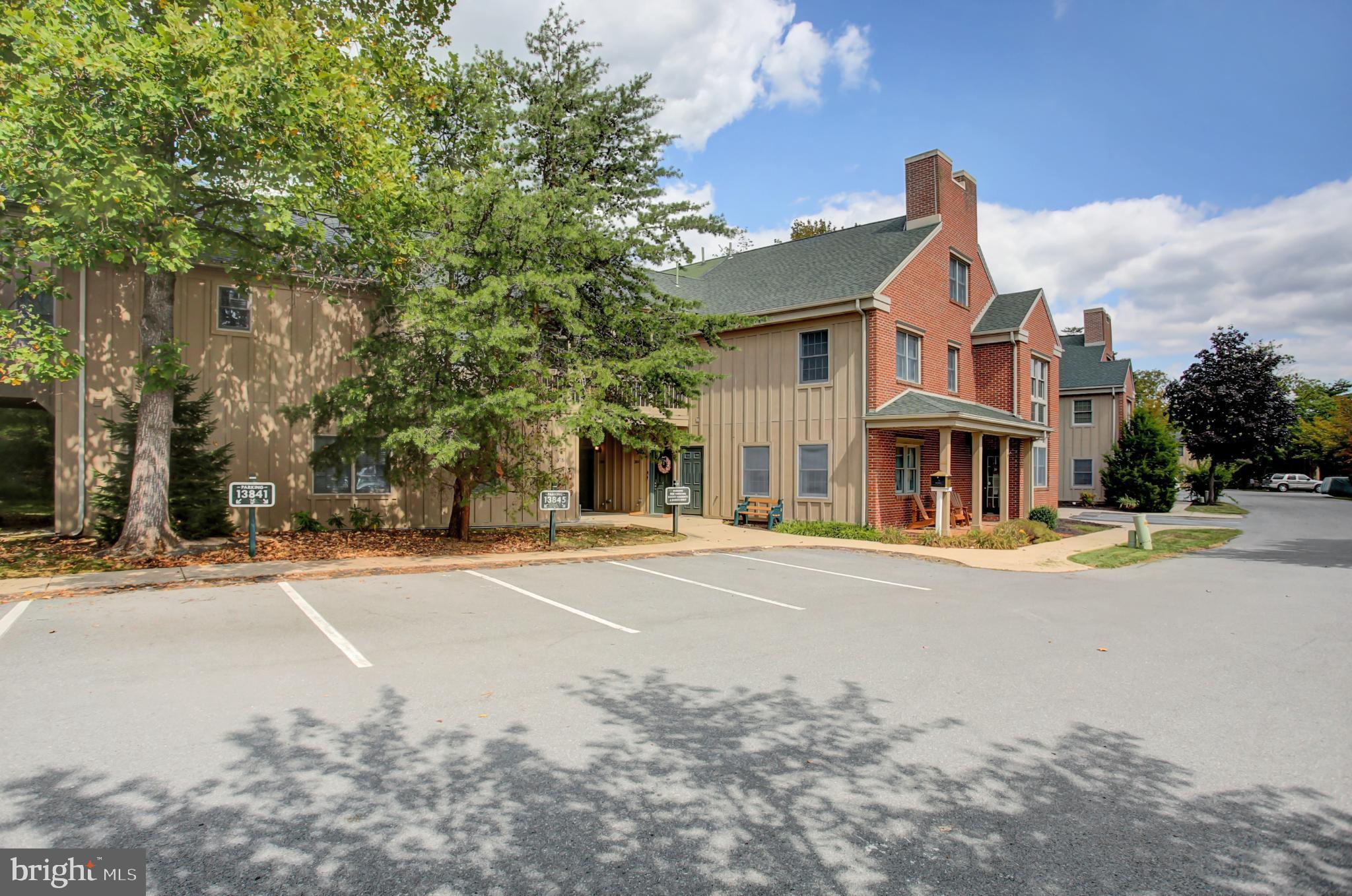 Nestled in the serene Whitetail Resort Community, this slope-side townhouse offers a perfect blend of comfort and style. The home features a timeless colonial design with a combination of brick and cedar, exuding warmth and character. The kitchen boasts ample table space, complemented by modern appliances including a refrigerator, built-in microwave, dishwasher, and gas stove. With four spacious bedrooms and three full bathrooms, including two complete primary suites, this home provides plenty of room for relaxation. The second primary suite (on the third floor) includes a full bath, huge walk-in closet, and some of the community's best views of the slopes! Enjoy cozy evenings in the living room by the gas fireplace. Or even better, step outside to your own private patio oasis, perfect for soaking in the stunning mountain and wooded views, and gorgeous nighttime skies. From the back patio you’re just steps away from the Northern Lights ski slope, accessible by a short lighted path. The brick patio was recently expanded to accommodate more seating, a great place to grill, and a Solo stove to warm up in between a few runs on the slopes! Outside you’ll also find a large storage closet, perfect for storing your snowy gear. With assigned parking and easy access to common areas, this home is designed for a lifestyle of ease and enjoyment. While winter activities might be the main attraction, you'll LOVE this community year-round! The Whitetail Resort Community is second to none, and offers beautifully landscaped grounds, saltwater swimming pool, hot tub, walking trails, and tennis/pickleball court. Endless hiking/biking trails, fishing, golfing, and hunting opportunities nearby! Don’t miss out – your mountain retreat awaits!