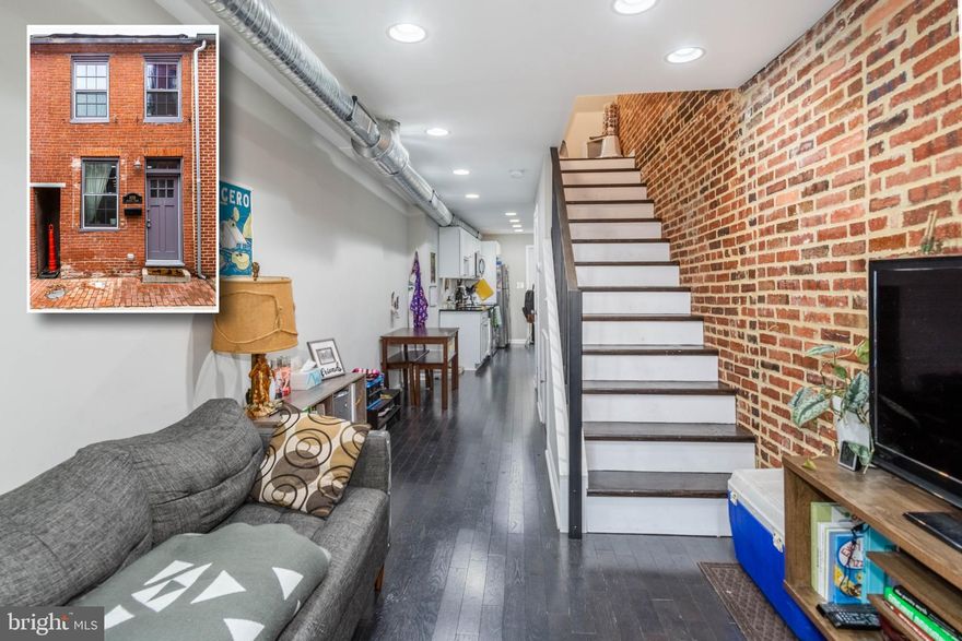 ABSOLUTELY CHARMING STARTER HOME IN PRIME FEDERAL HILL LOCATION!  Open floor plan featuring hardwood floors throughout, inviting living room and dining area with exposed brick and exposed ductwork, Chef's kitchen w/ granite counters, ss appliances, and lots of cabinet space, main level half bath, upper level with 2 bedrooms and 1 full bath, and a shared communal patio!  Conveniently located close to the newly renovated Cross Street Market, Federal Hill restaurants and shopping, and convenient to downtown Baltimore and I-95!