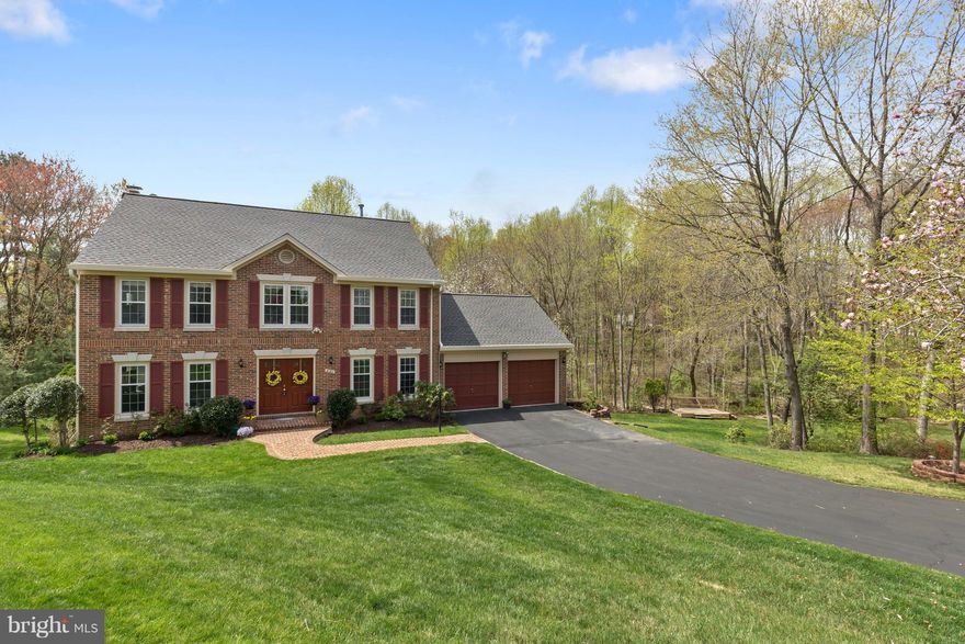 Impressive Lynnwood colonial backing to heavily wooded acreage & stream. You'll love the privacy and convenience of this home's location>Owner's have spent 100k+ updating this home>Hardwood flrs, granite counter-tops, SS appliances>New roof & siding>Hall bath just finished>Remodeled Master bath>Windows replaced>Screened porch & multi-level deck>Rec room is wide open w/WO>legal 5th bdrm>A+ schools!