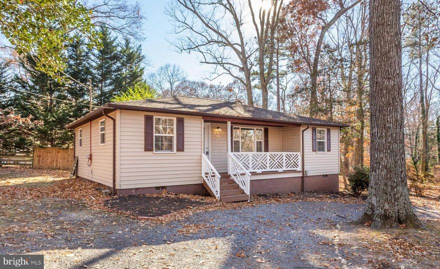 Lovely, 900+ square foot rambler, built in 1967, and remodeled in 2010. There is a level treed lot surrounding this home, and is located on a corner lot. Located near schools, shopping and entertainment, this well insulated, affordable rancher has 2/3 bedrooms, 1 bath with Jacuzzi tub, cozy front porch, and large level lot. Close to Solomons Island, and the best fishing in Southern Maryland! Remodeled in 2010, new roof, windows, cabinets, siding and electric heating was installed. This has been an excellent rental for the owner, but would work extremely well for a small family or a retired couple. Please contact your realtor soon, this one will not last long!