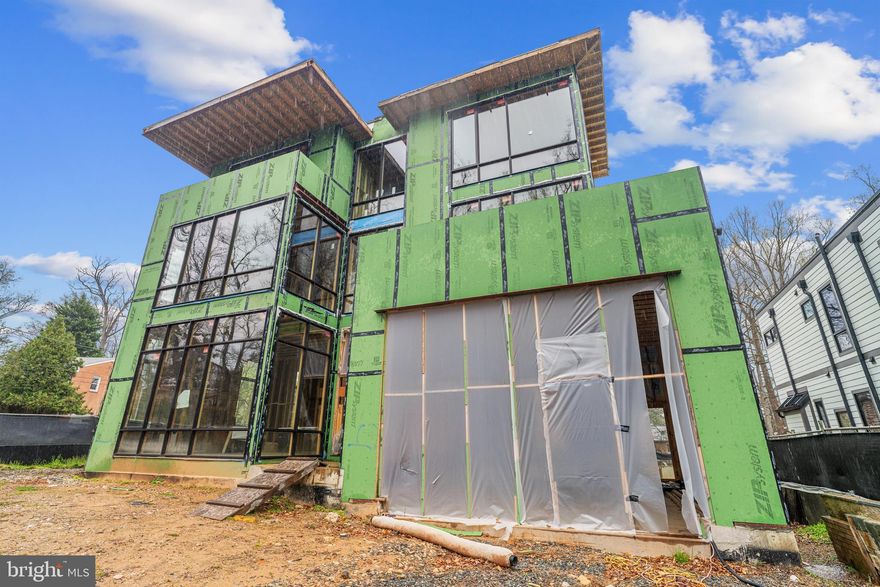 Finish your dream home in Chevy Chase DC with views of Rock Creek Park. All permits and drawings have bene approved by DC and property is ready to be completed. This home is designed to capture all the views and natural light with tons of floor to ceiling windows and a rooftop area with an outdoor kitchen. An expansive home with 8 bedrooms including the entire 3rd level as the primary suite. There are two offices in the home, a wine cellar, gym, theater room, and elevator shaft. This completely custom home will check all the boxes. The home is halfway finished but ready for final completion and your personal touches. Home to be completed by buyer with buyer’s builder.