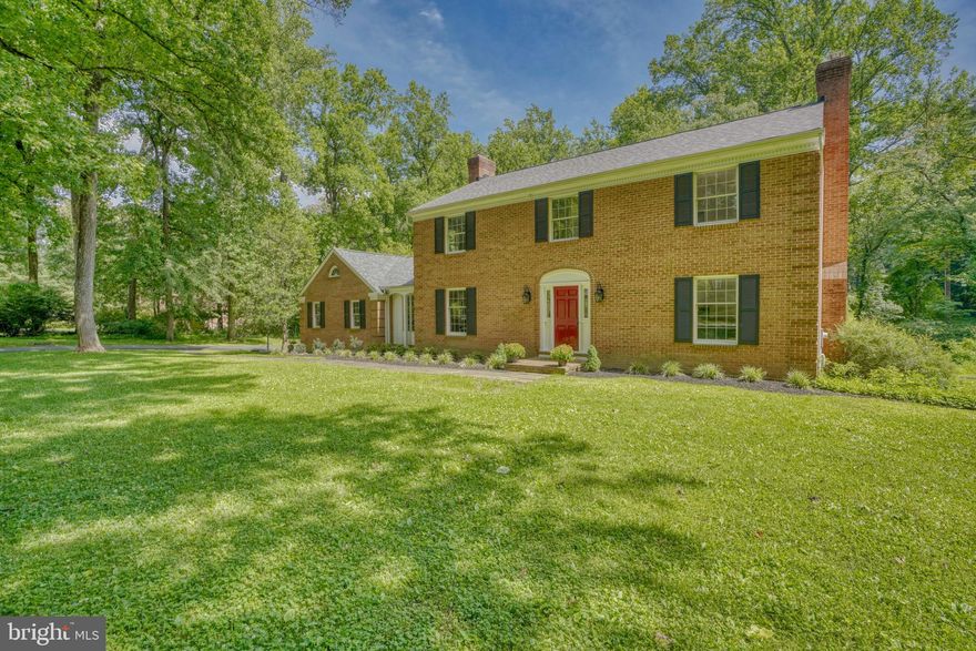 Desirable Falls Road Corridor!!!  Beautiful Move-in ready All-Brick Colonial featuring 4 Bedrooms, 2 Full Baths, 2 Half Baths, and Oversized 2-Car Garage.  This home is situated on just under 2 acres in this Highly Sought-After Lutherville location!  Conveniently located to 83 and 695, and Shopping!  The main level features a foyer entry-way with half bath, large living room with wood burning fireplace, lovely formal dining room with built-in cabinets, den/office with built-ins, spacious eat-in kitchen with granite counters and recessed lighting, family room off of the kitchen with 2nd wood burning fireplace.  A mud room leads out to the oversized garage.  French doors off of the family room/kitchen lead out to multi-level decks overlooking the spacious and private backyard. The upper level features a master bedroom with a walk-in closet and newly remodeled bathroom.  Three more very generously sized bedrooms and a hall bath complete the upper level.  The home features hardwood flooring throughout 1st and 2nd floors.  The finished basement, which offers plenty of space to hang/entertain includes a recreation room with recessed lighting and another half bath.  There is available space which could be finished for a 5th bedroom.  Rounding out the basement is a laundry room.  The back utility room coupled with space under the stairs, provide ample storage. 50 Year top-of-the-line Architectural Roof installed in 2018. Water Heater replaced 2016.  All inspections have been completed!  These include, but are not limited to the following: Home, Well (to include water yield and quality), Chimney, Septic, Termite, Mold, and HVAC. Reports are provided in the uploaded documents.