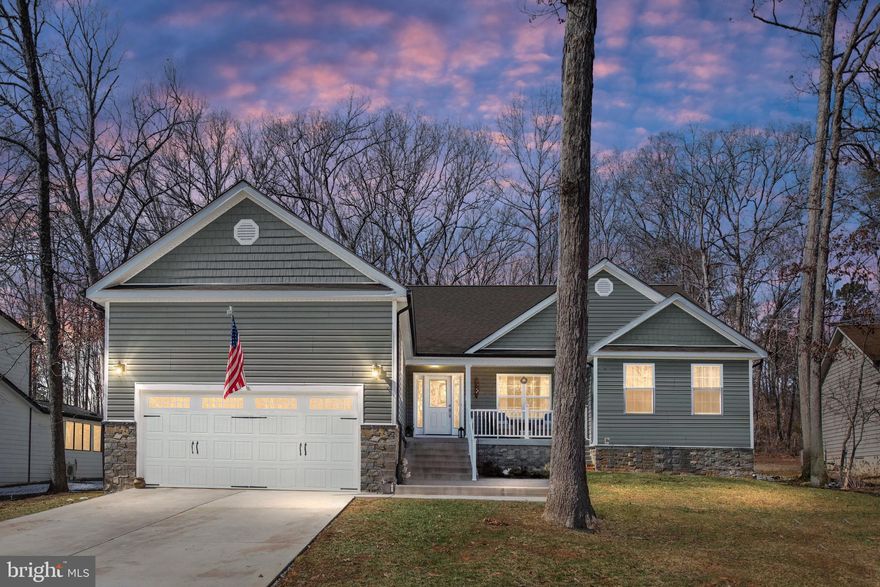 **Welcome Home to Your Dream Retreat in Lake of the Woods!**

Step into your stunning rambler, a true gem in the exclusive gated waterfront community of Lake of the Woods. Better than new construction, this home is just two years old and offers a blend of luxury and comfort that is sure to impress. Nestled in a serene cul-de-sac, the inviting front porch beckons you inside, where an open-concept floor plan flooded with natural light awaits.

As you enter, you’ll be greeted by soaring vaulted ceilings and luxury vinyl plank flooring that flows seamlessly through the main living areas. The gourmet kitchen is a chef’s dream, featuring elegant granite countertops, modern appliances, and ample cabinet space, perfect for hosting family gatherings or intimate dinners.

The spacious living area effortlessly connects to a screened porch, where you can savor your morning coffee or unwind in the evening while enjoying the peaceful surroundings. The expansive primary bedroom is a true sanctuary, complete with high ceilings and an en-suite spa-like bath that boasts a luxurious walk-in shower, double granite vanities, and a beautifully tiled floor. Two additional bedrooms and a well-appointed bath provide plenty of space for guests or family.

Living in the Lake of the Woods community means embracing a lifestyle rich in leisure and adventure. Enjoy waterfront activities such as boating, water skiing, and fishing, all within the safety and privacy of this secure neighborhood. For golf enthusiasts, the 18-hole golf course offers a perfect way to spend your afternoons. The community clubhouse, with its breathtaking views of the water, serves as a wonderful gathering place for residents, fostering a sense of community and belonging.

This home not only caters to your desires for luxury living but also provides an exceptional location to enjoy the beauty of nature and the tranquility of waterfront living. Whether you’re entertaining friends, enjoying family time, or simply soaking in the mesmerizing views, this property is truly a dream come true.

Don’t miss the opportunity to make this remarkable home your own. Experience the perfect combination of modern elegance and a vibrant community lifestyle in Lake of the Woods. Welcome home!