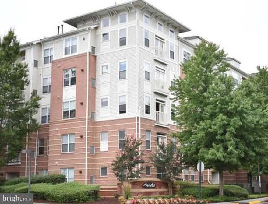 This open and sun filled condo is the full package! Immaculate with a modern and sleek look. With this lovely unit you have access to an indoor basketball court, fitness center, pool, a secure building, two covered garage spaces, two guest parking passes; elevator in next door building to the right; Amenities include a  business center, club house, courtyards, and much more. Prime Location! Right across the street from the Vienna Metro and minutes to I-66, 123, 50 etc. Professionally Managed.