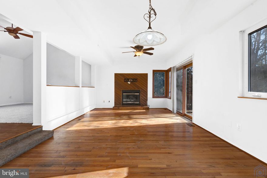 New work improvements made recently! New carpet and Paint to give this property some extra highlights!  FHA-approved NOW! Come see this property that checks all the boxes with the potential to be everything you've always wanted. Make this house your dream home! Blue Ribbon School District with plenty of parking. The home backs to the woods. There are 2 living rooms on the main level which would be a great opportunity for a main floor office or guest bedroom! The bonus features are a fireplace located in the dining room and the basement outside entrance with a full bathroom in the basement. All the bedrooms are good useable sizes. Do NOT forget this is a Water privilege community with a boat ramp and boat slip options for a waiting list.