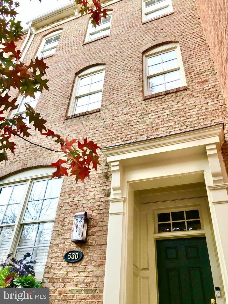 Beautifully renovated 4-level townhome located in historic Old Town, Alexandria. This ideally located home has been recently updated with high-end finishes and major appliances.  Its open floor-plan onto a private Travertine patio, makes it a perfect home to entertain your family and guests.  As you enter this stately townhome off of N. Pitt Street on the main level, the 10' ceilings with recessed lighting throughout, beautifully maintained hardwood floors, and abundant natural light through classic white-wood shutters, invite you into the grand living room.  As you continue just past the living room, the gourmet kitchen features stainless steel Bosch appliances and quartizite countertops. The adjacent dining and additional living room area, seamlessly open onto the outdoor patio and grill area. This is also your back entrance to the over-sized 2-car garage.  A powder room wraps up our tour of the Main Level of this home.  The lower level, with it's high ceilings, houses the recreation room/casual living space and a gas fireplace. You will also find a guest room and full bathroom as well as an abundance of storage on this lower level.   As we head  up to the 2nd floor of this lovely home you will find the spacious Master suite featuring two walk-in closets with custom shelving.  The luxurious master bath includes touchless mirrors with defrost, quartzite double vanity countertops, marble tile and flooring, a separate water closet with heated bidet and a glassed enclosed shower with a multi shower head.  On this 2nd floor you will also find a conveniently located laundry room and a private office.  One floor up, on the last and final floor of our tour, you will find a spacious den with floor to ceiling built-ins. On either side of den are two largbedrooms each with their own bathroom, and walk-in closets. This beautiful townhome property is a short walk to the waterfront, restaurants, Trader Joe's and other markets in Old Town as well as shops and parks.